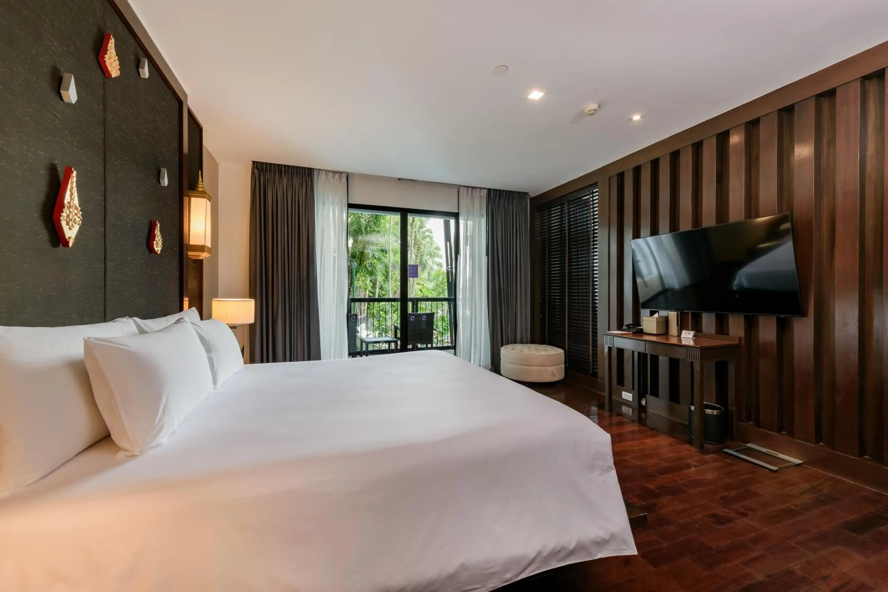 Bed in Centara Anda Dhevi Resort & Spa Krabi