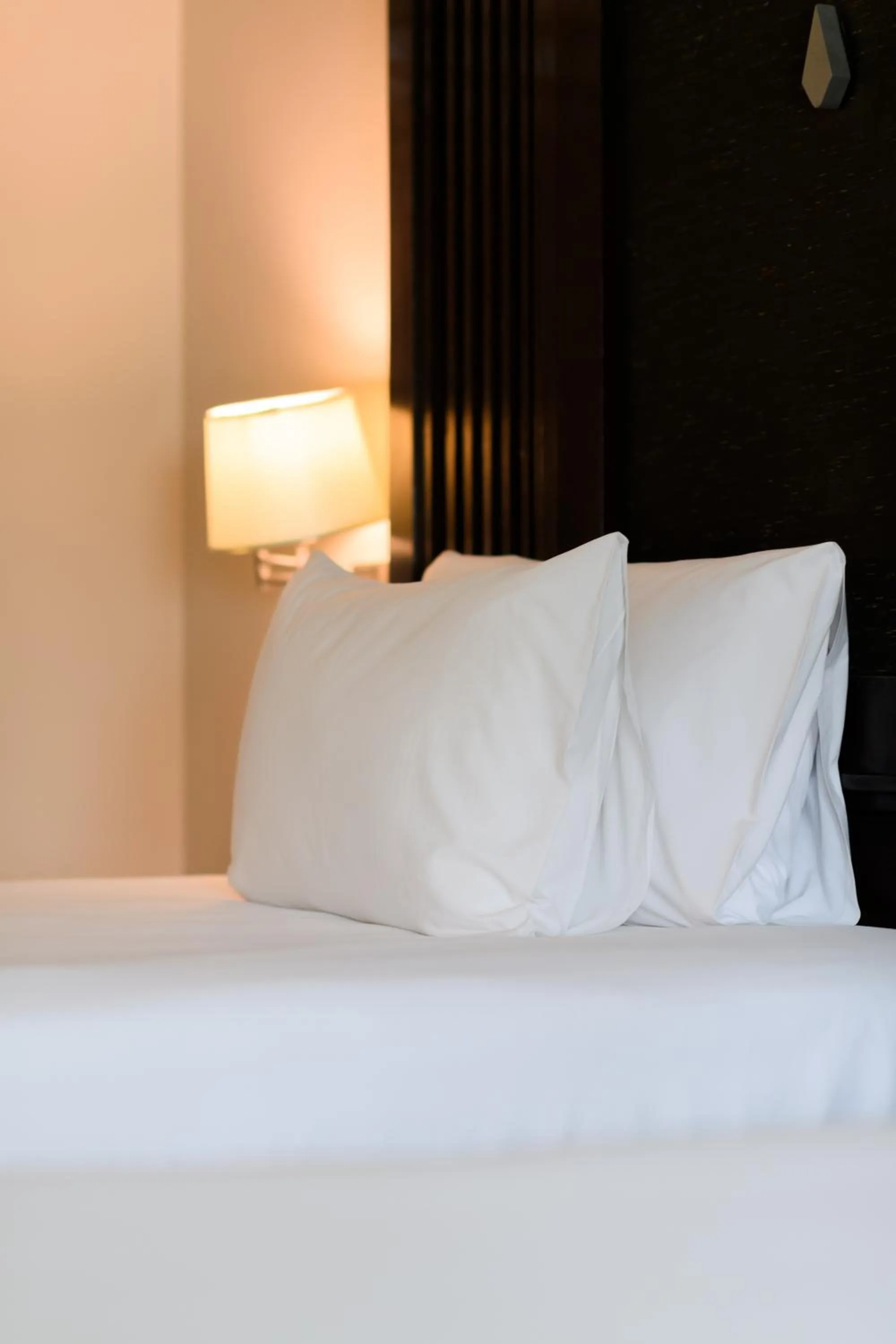 Bed in Centara Anda Dhevi Resort & Spa Krabi