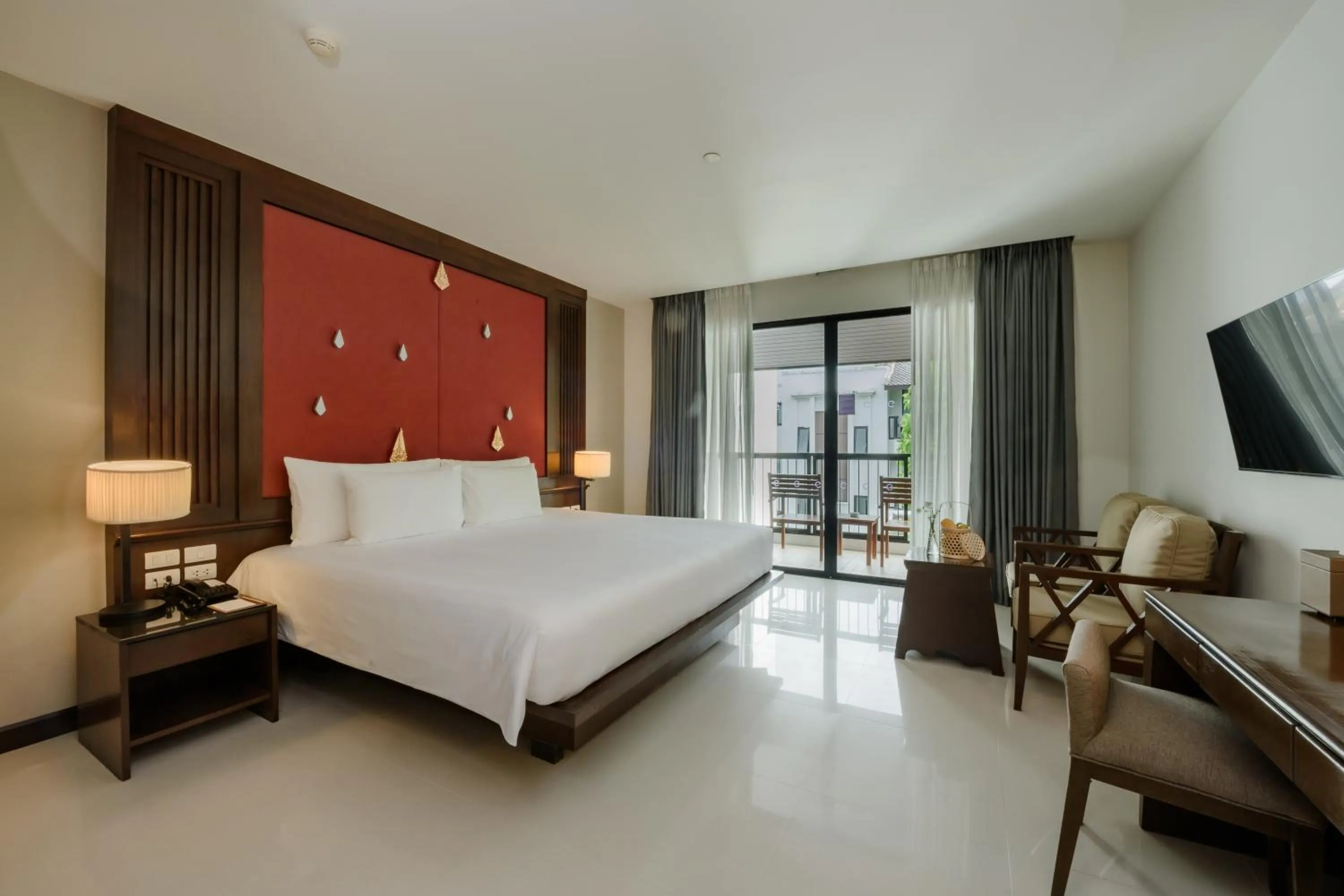 Bed in Centara Anda Dhevi Resort & Spa Krabi