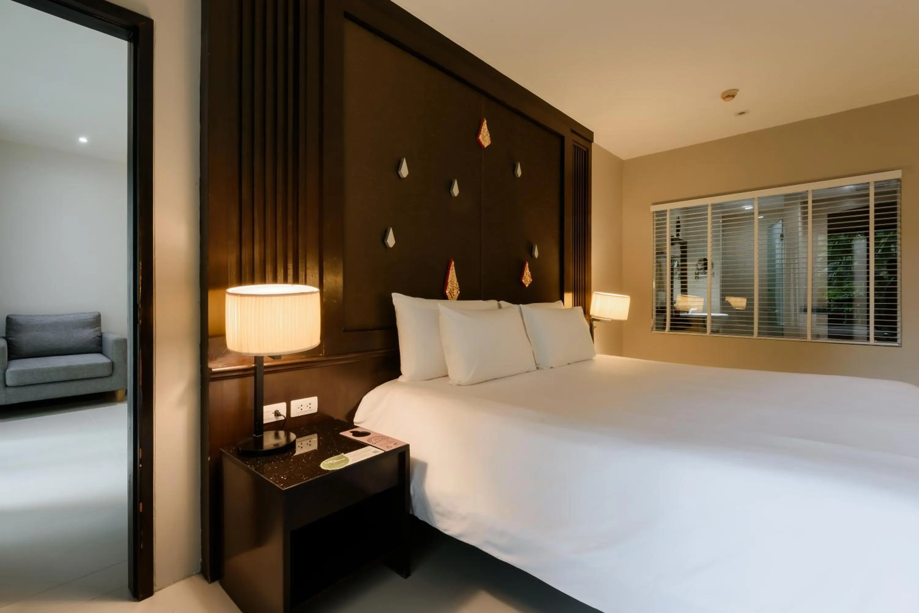 Bed in Centara Anda Dhevi Resort & Spa Krabi