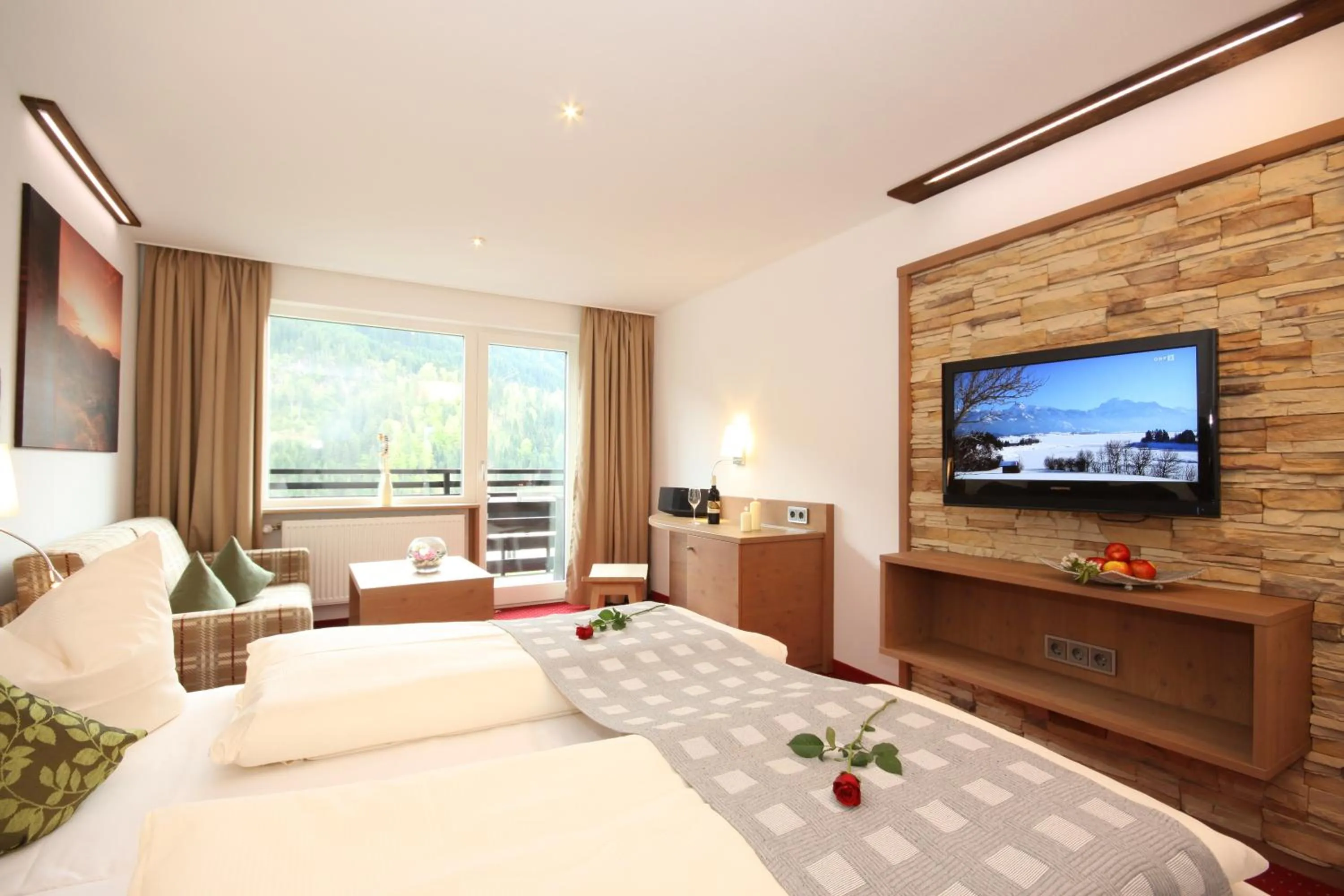 Photo of the whole room, Bed in Sporthotel Walliser