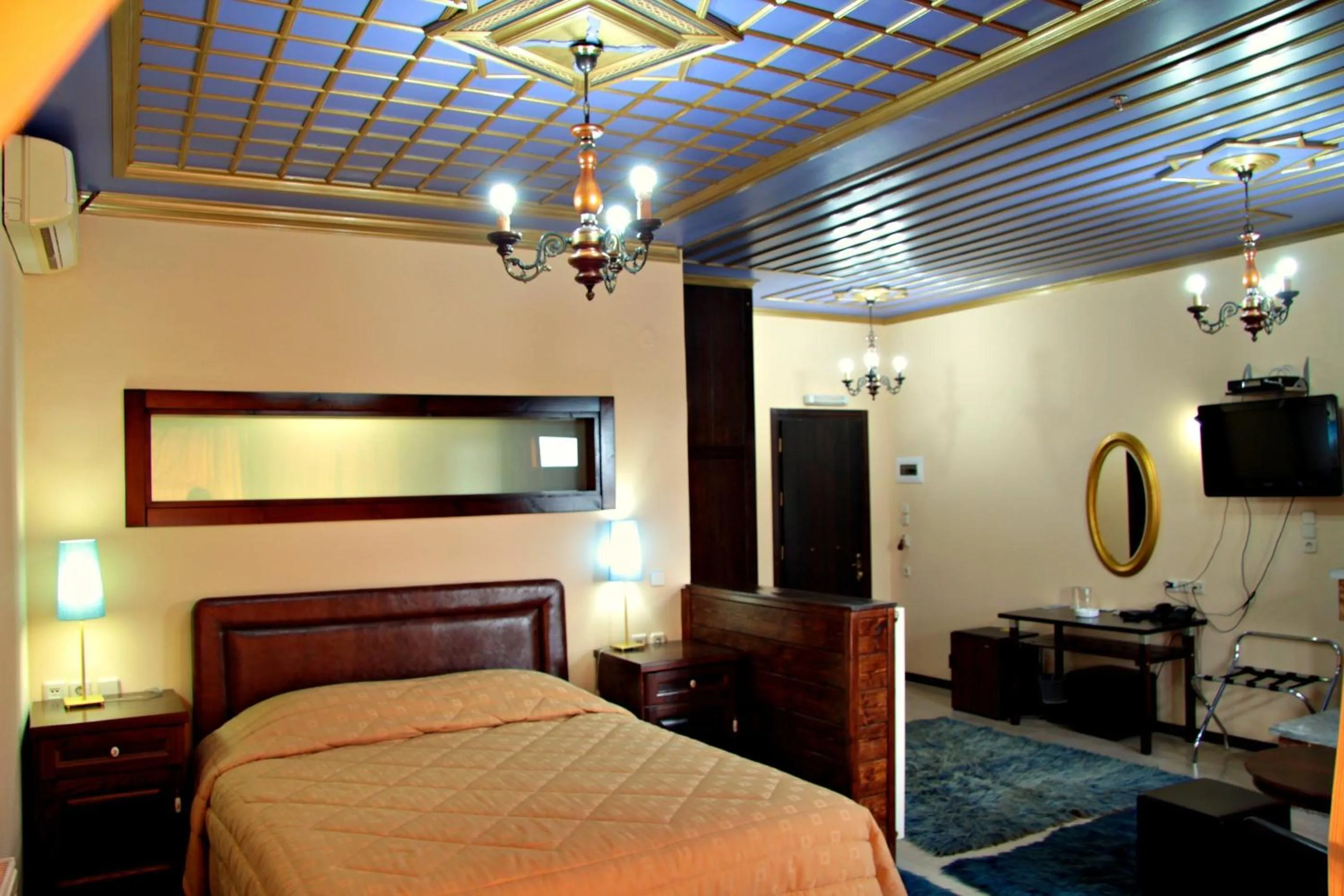 Bed in Hotel Taxiarches