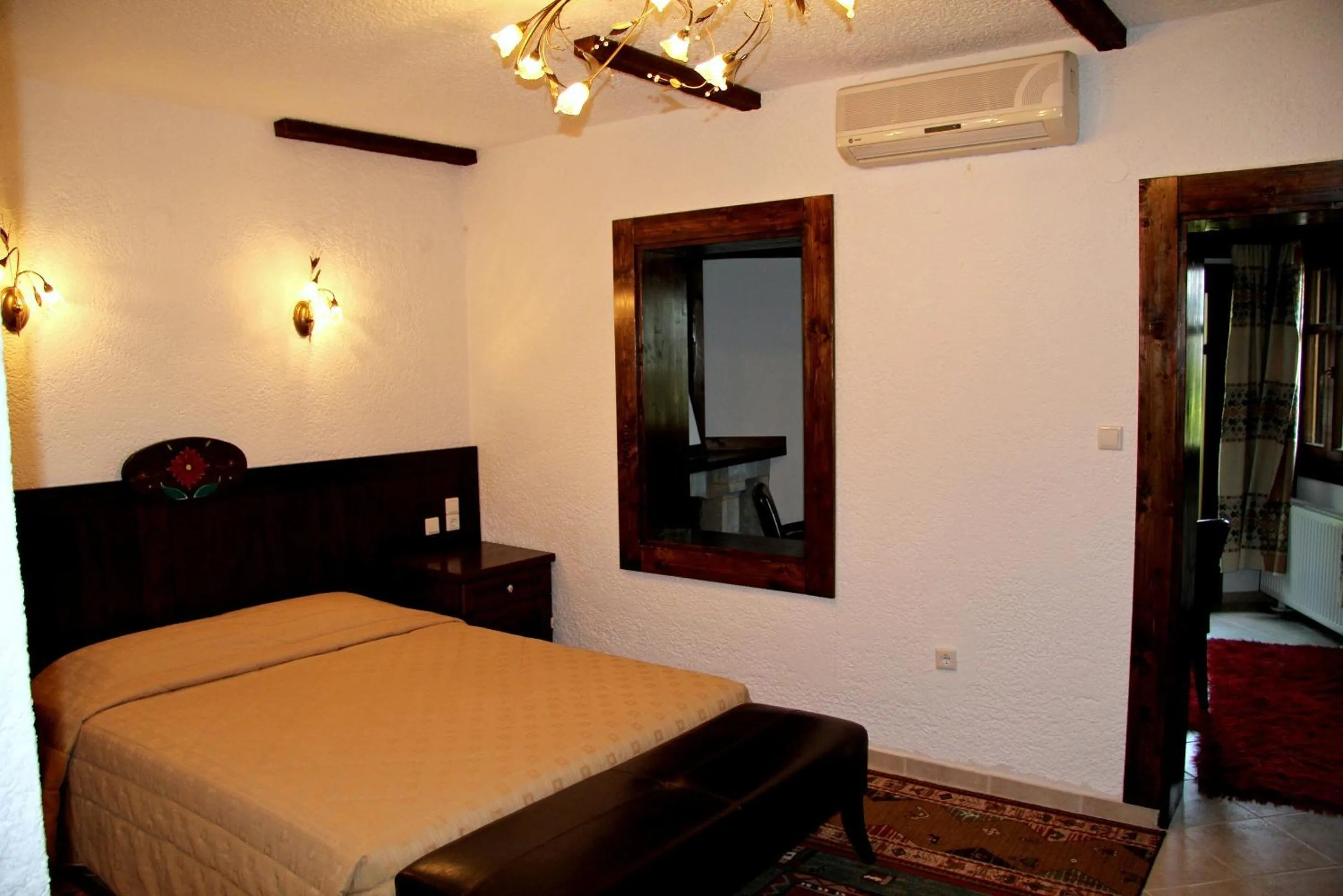 Bed in Hotel Taxiarches