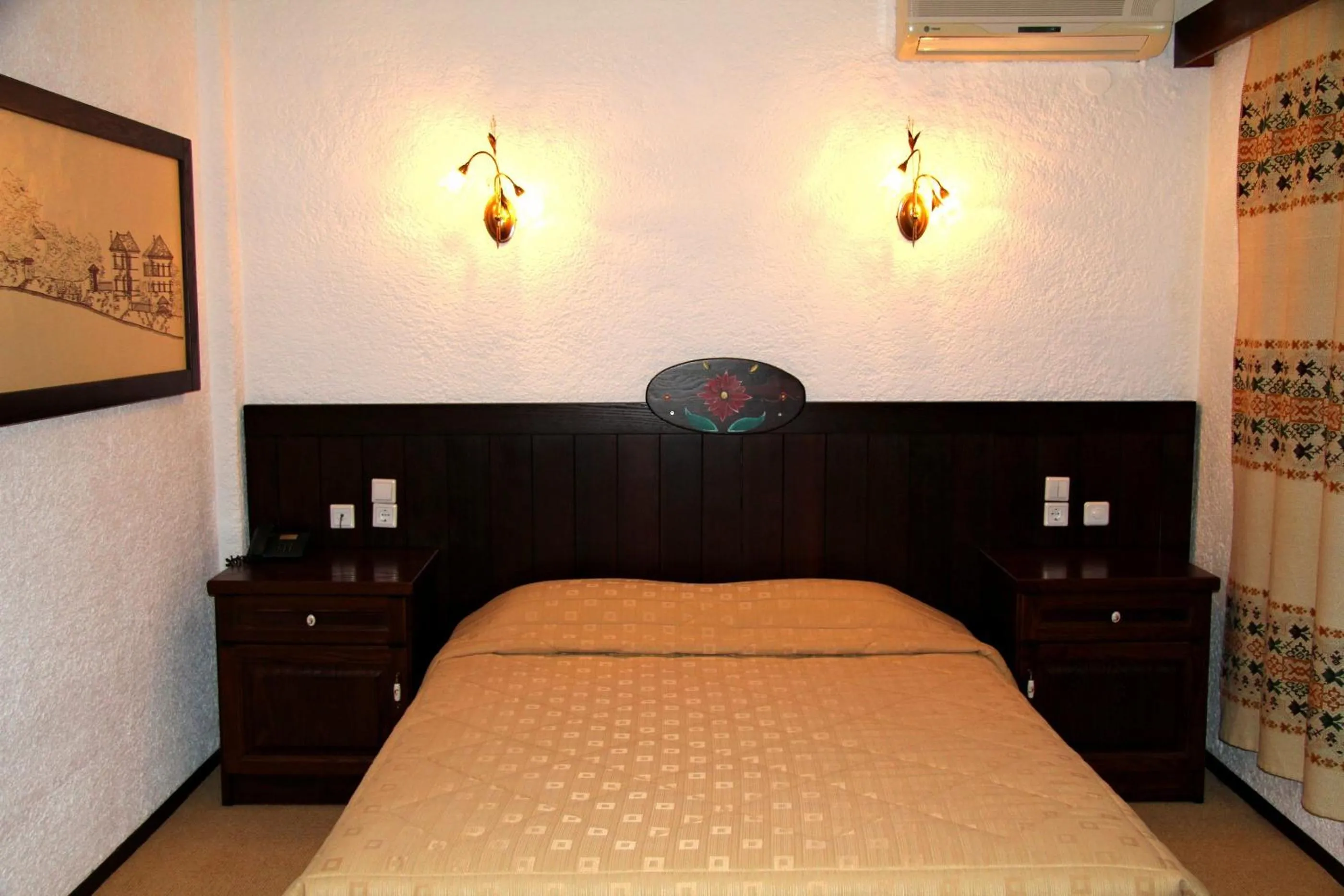 Bed in Hotel Taxiarches