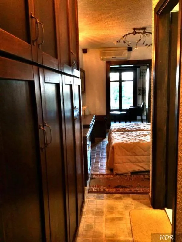 Bed in Hotel Taxiarches