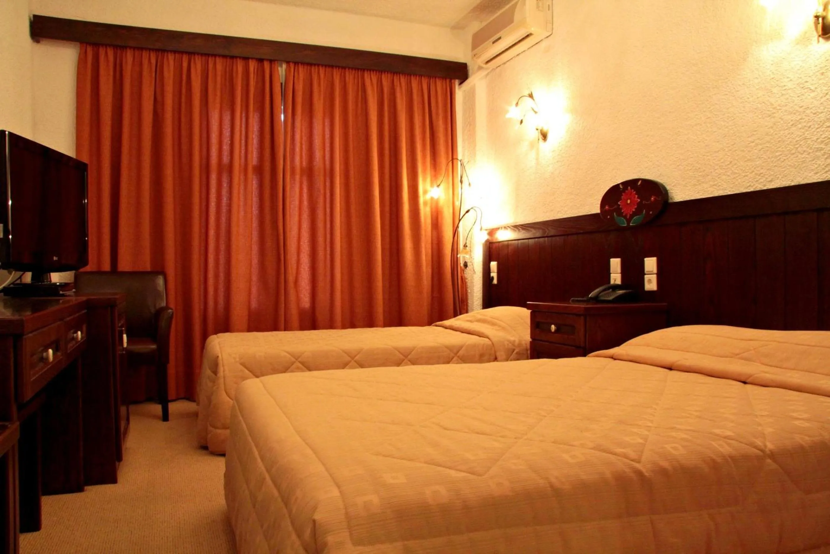 Bed in Hotel Taxiarches