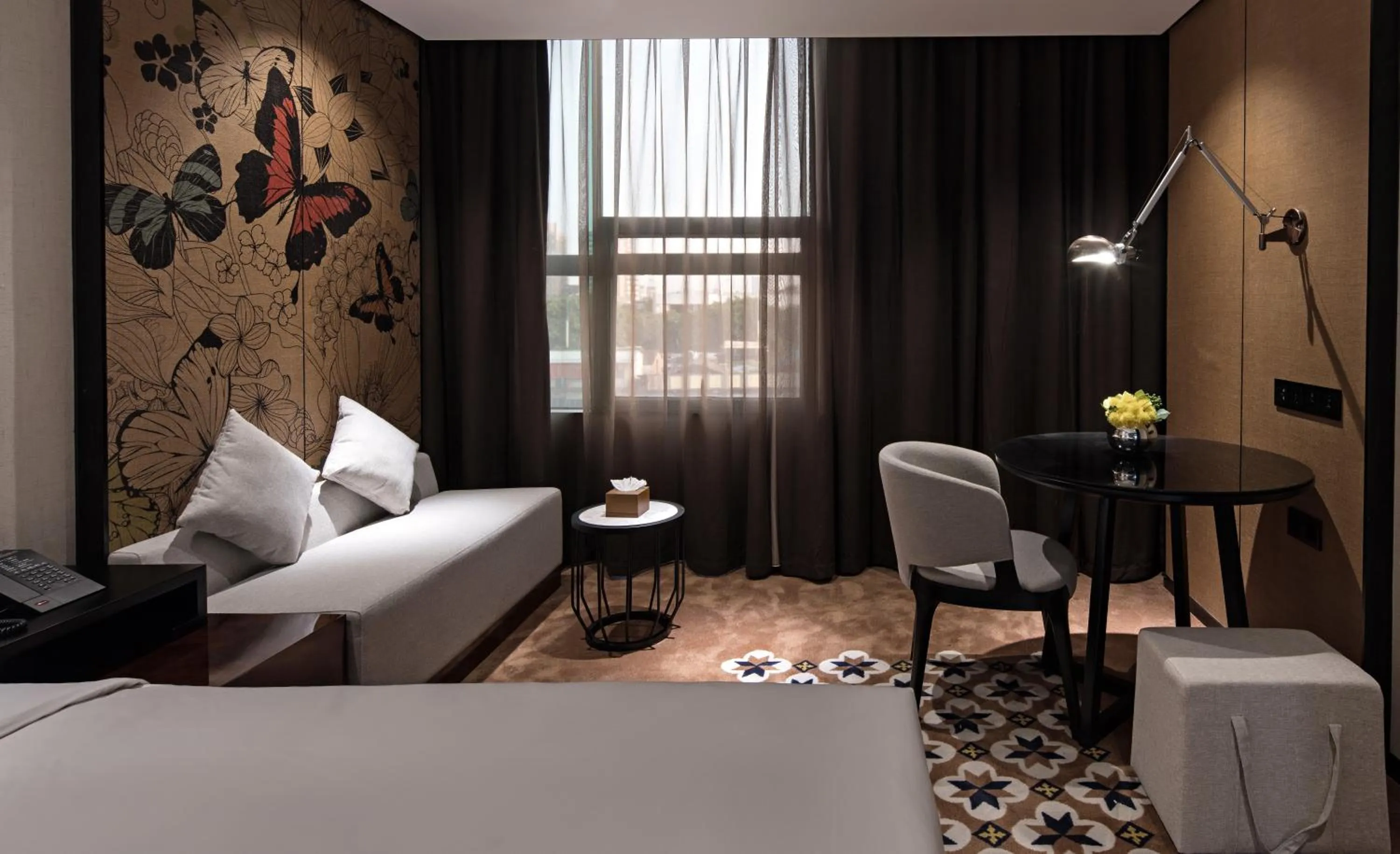 Seating area, Bed in Paco Hotel Chebeinan Metro Guanghzou