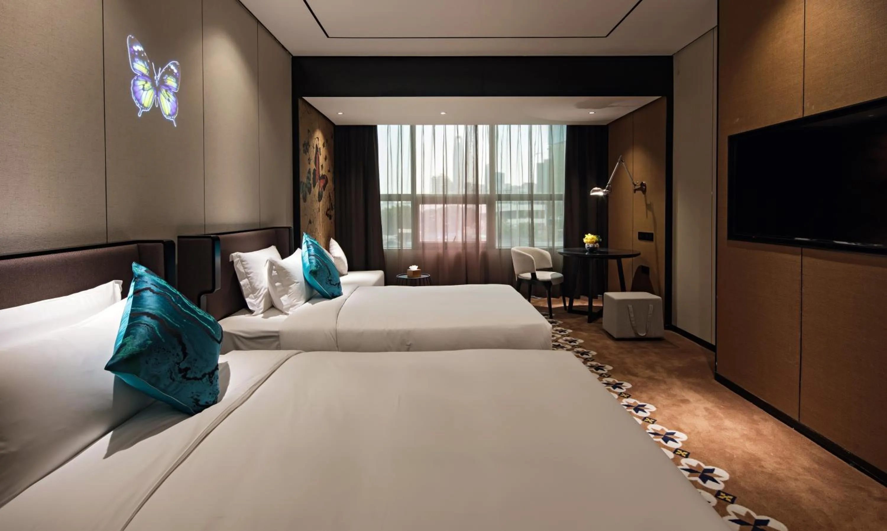 Bed in Paco Hotel Chebeinan Metro Guanghzou