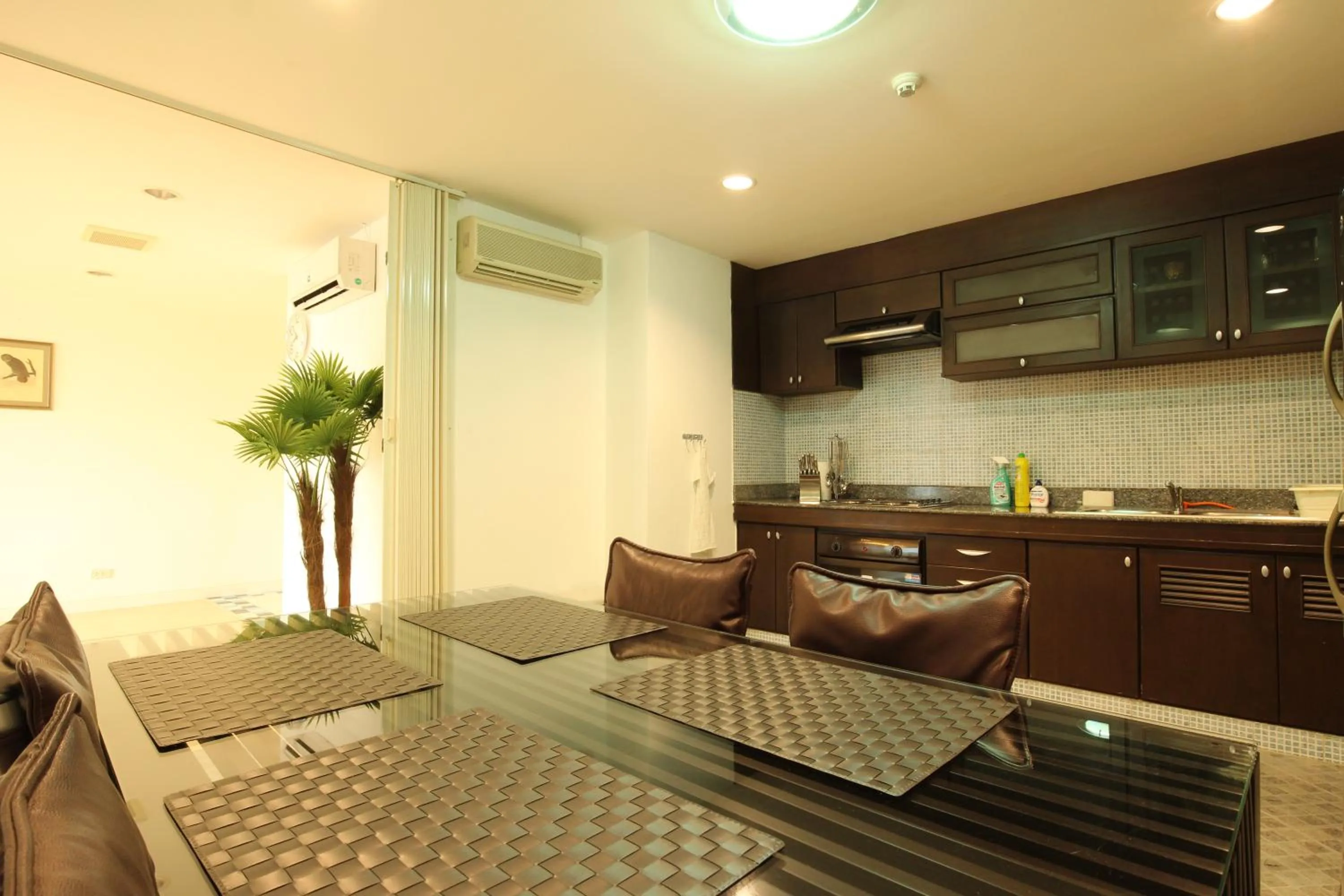 Kitchen or kitchenette in Serena Sathorn Suites