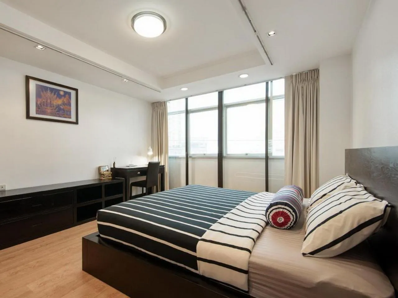 Bed in Serena Sathorn Suites