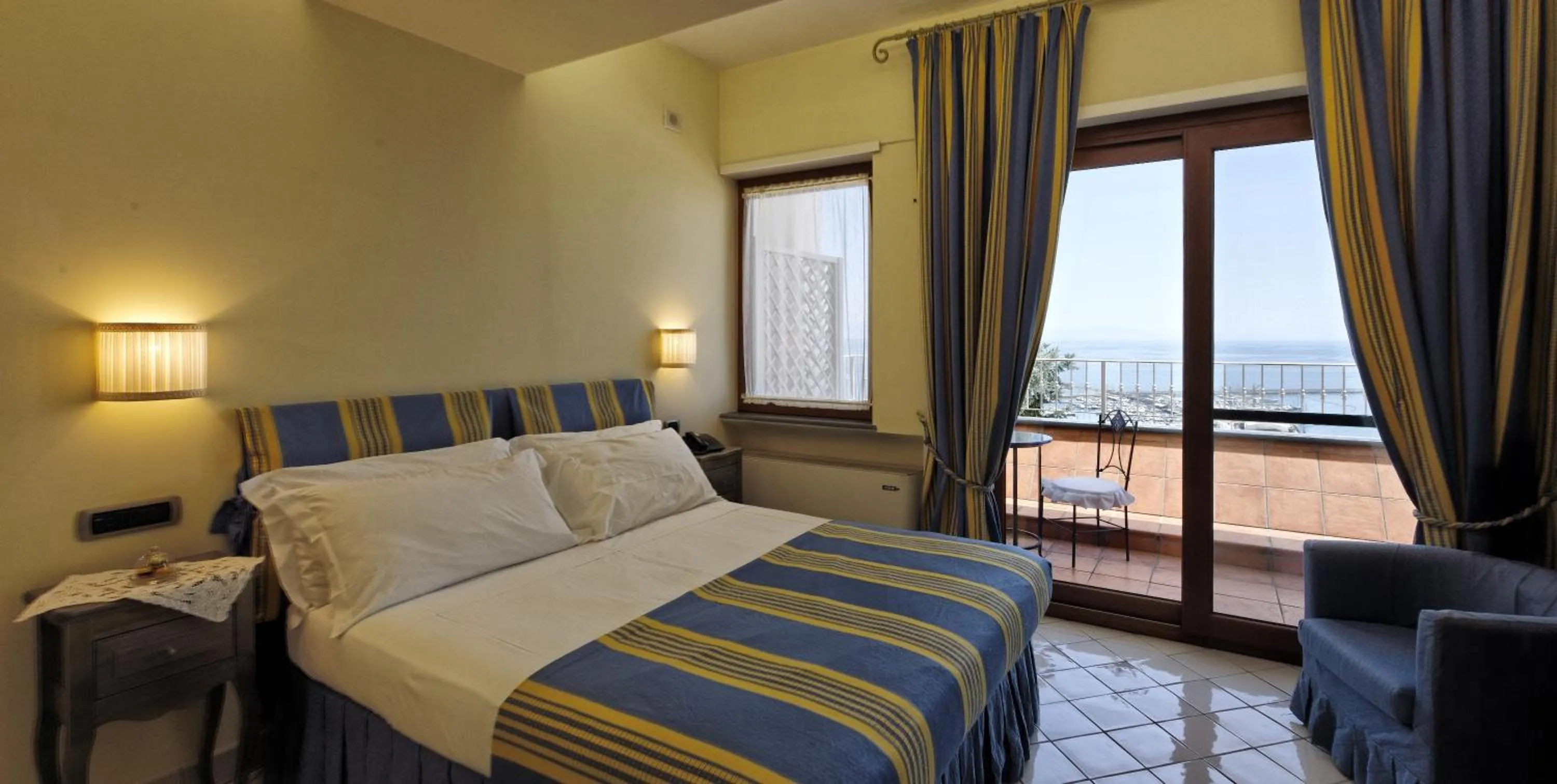 Bed in Villa Poseidon -Boutique Hotel-