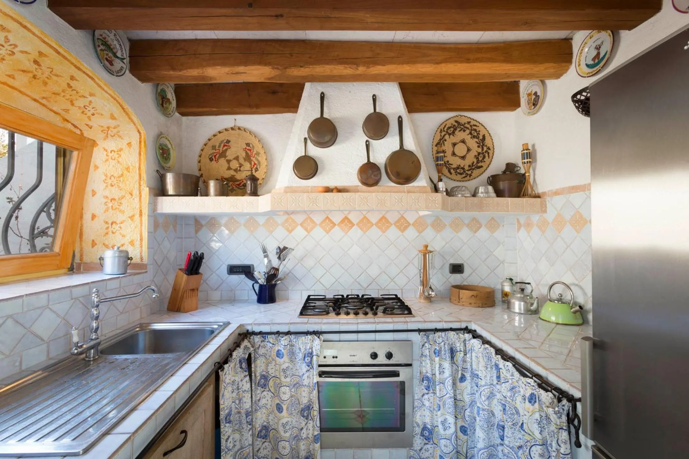 Kitchen or kitchenette in Le Case Di Capriccioli