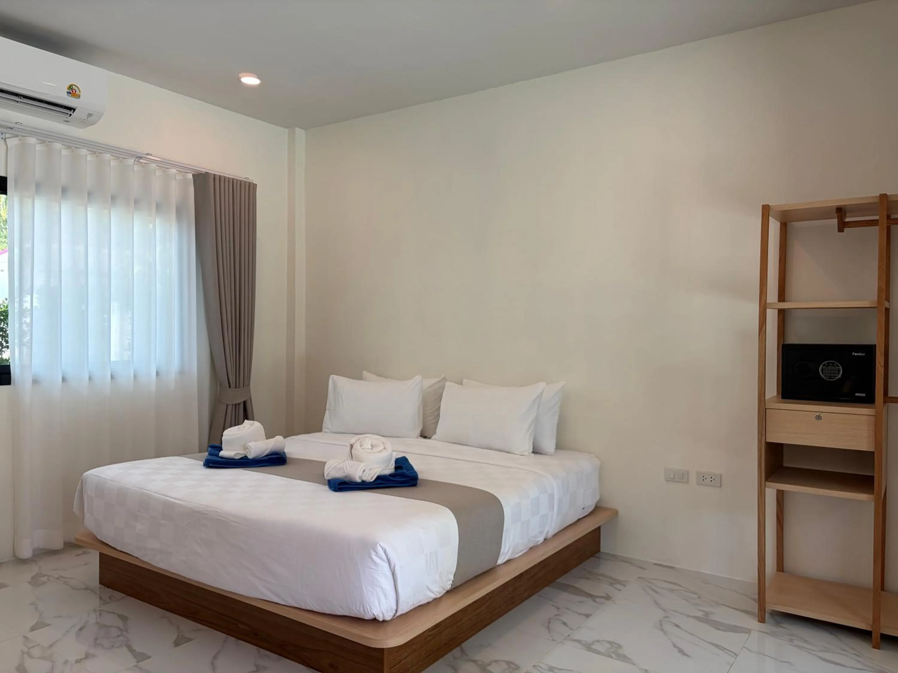 Bed in Pinky Bungalows Resort & Villa