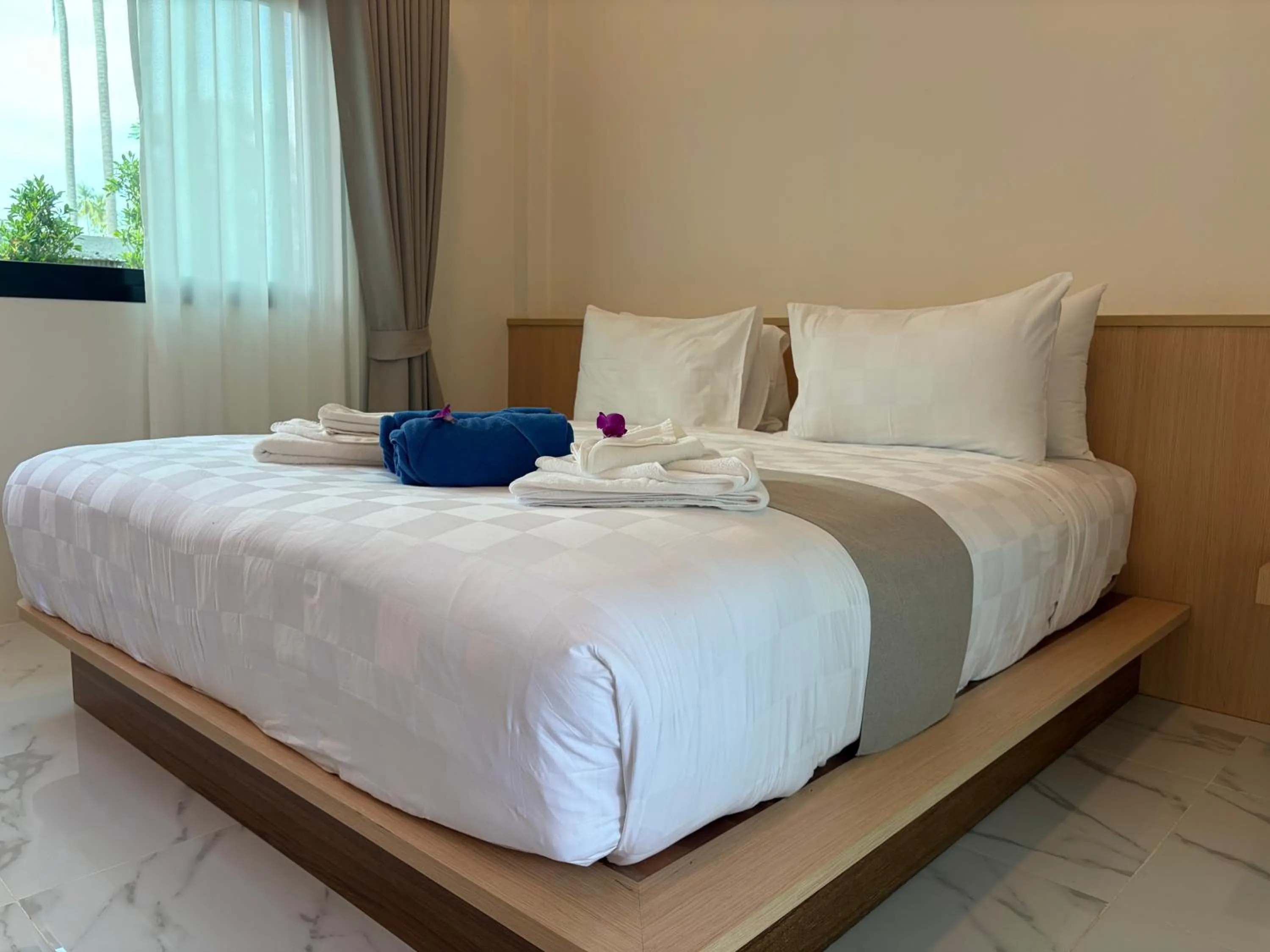 Bed in Pinky Bungalows Resort & Villa