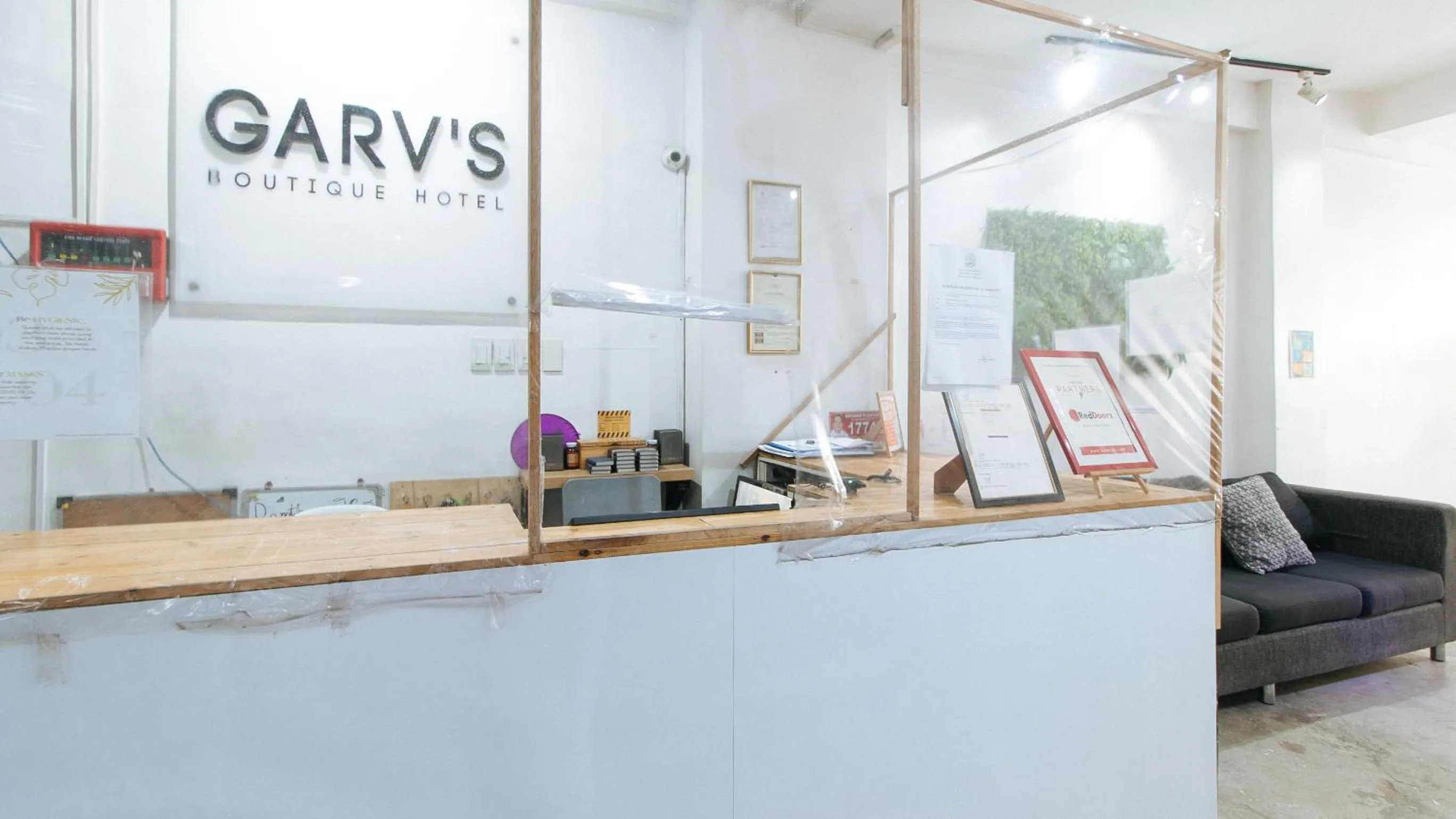 Property logo or sign in RedDoorz Plus at Boni Avenue Mandaluyong