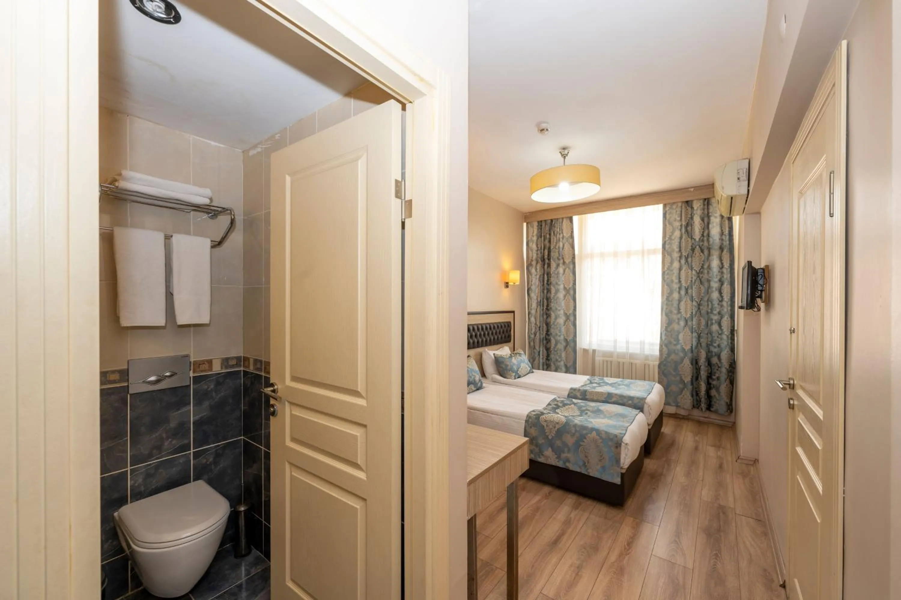 Photo of the whole room, Bed in Tugra Hotel