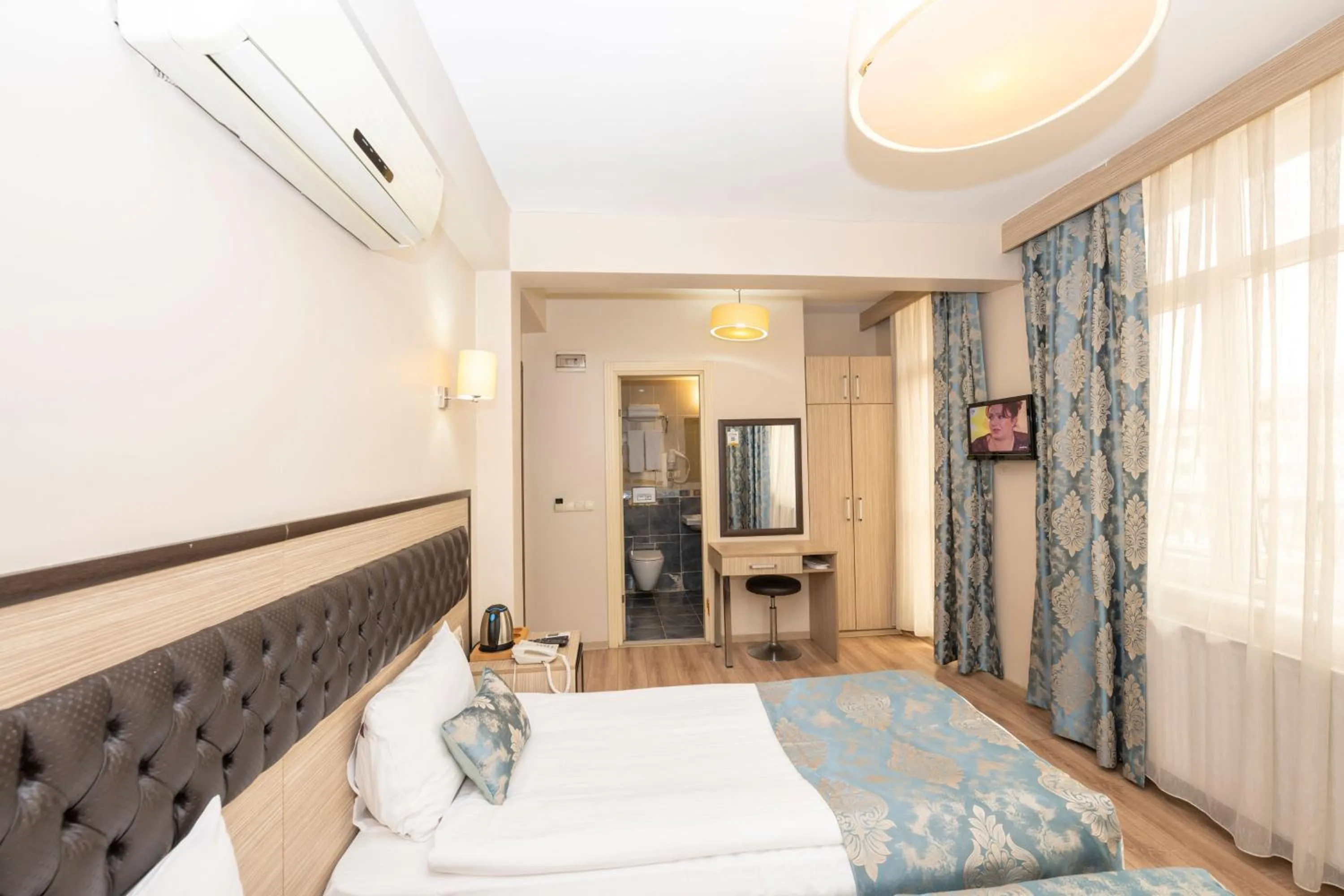 Photo of the whole room, Bed in Tugra Hotel