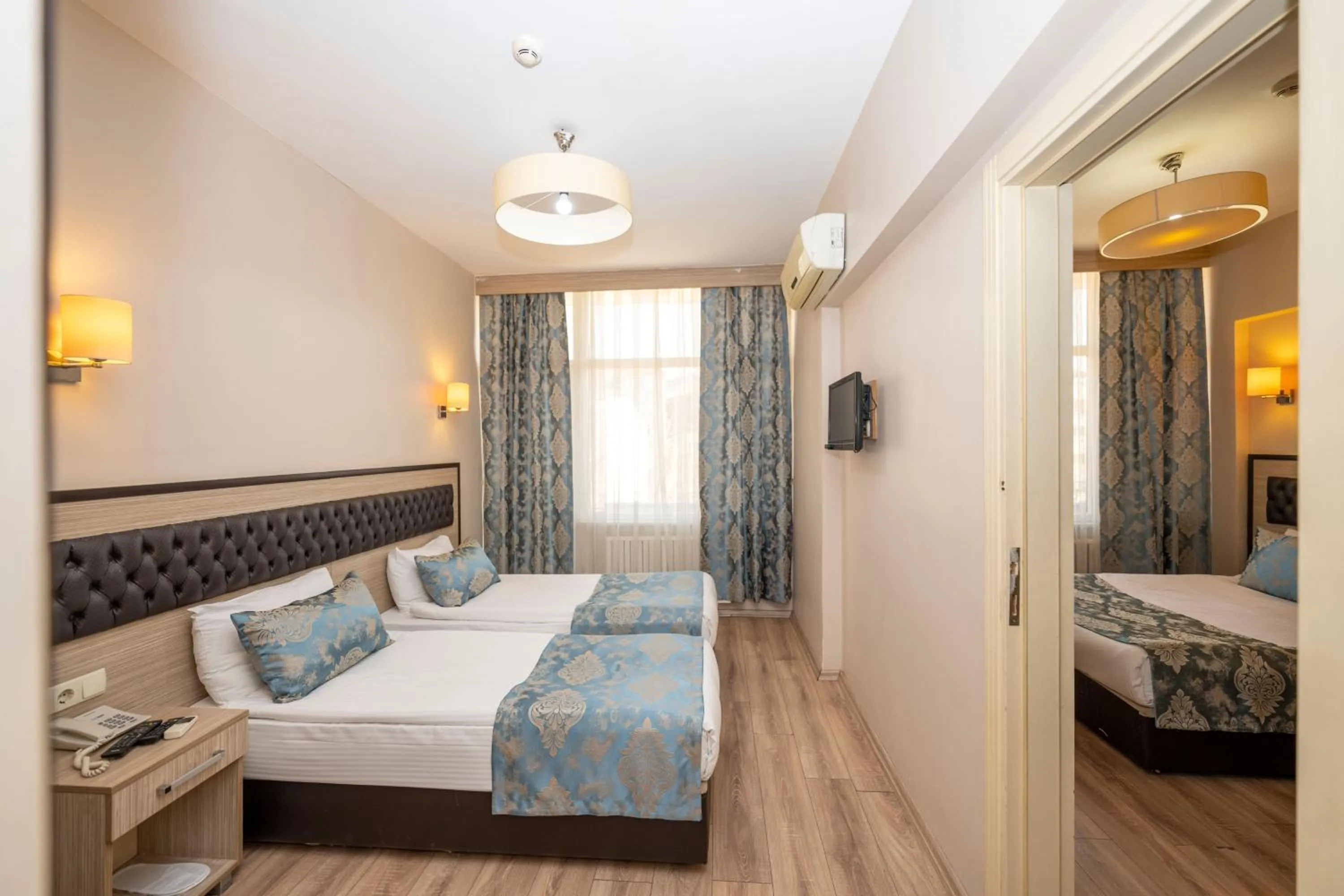 Photo of the whole room, Bed in Tugra Hotel