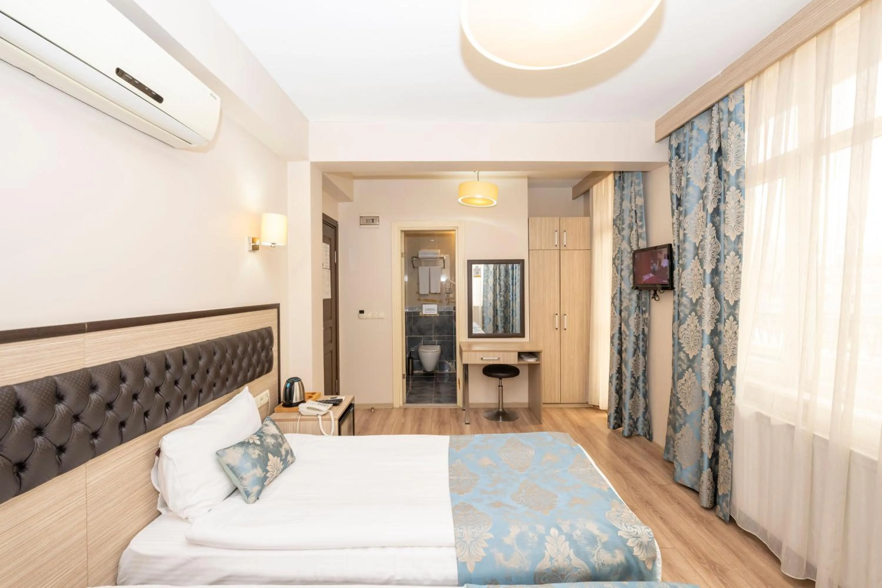 Photo of the whole room, Bed in Tugra Hotel