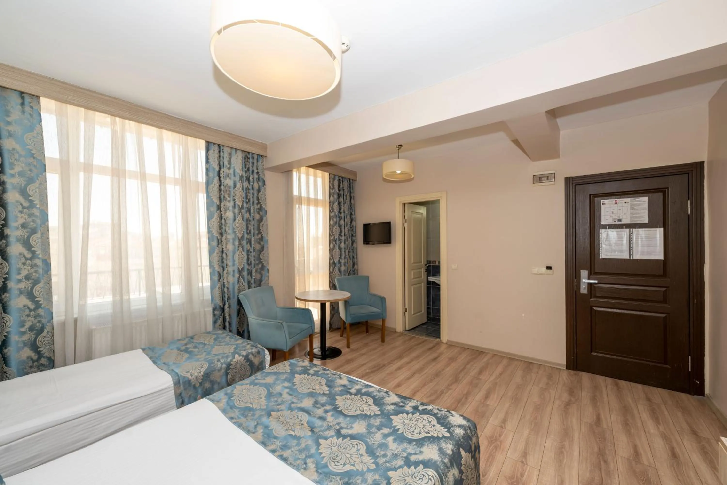 Photo of the whole room, Bed in Tugra Hotel