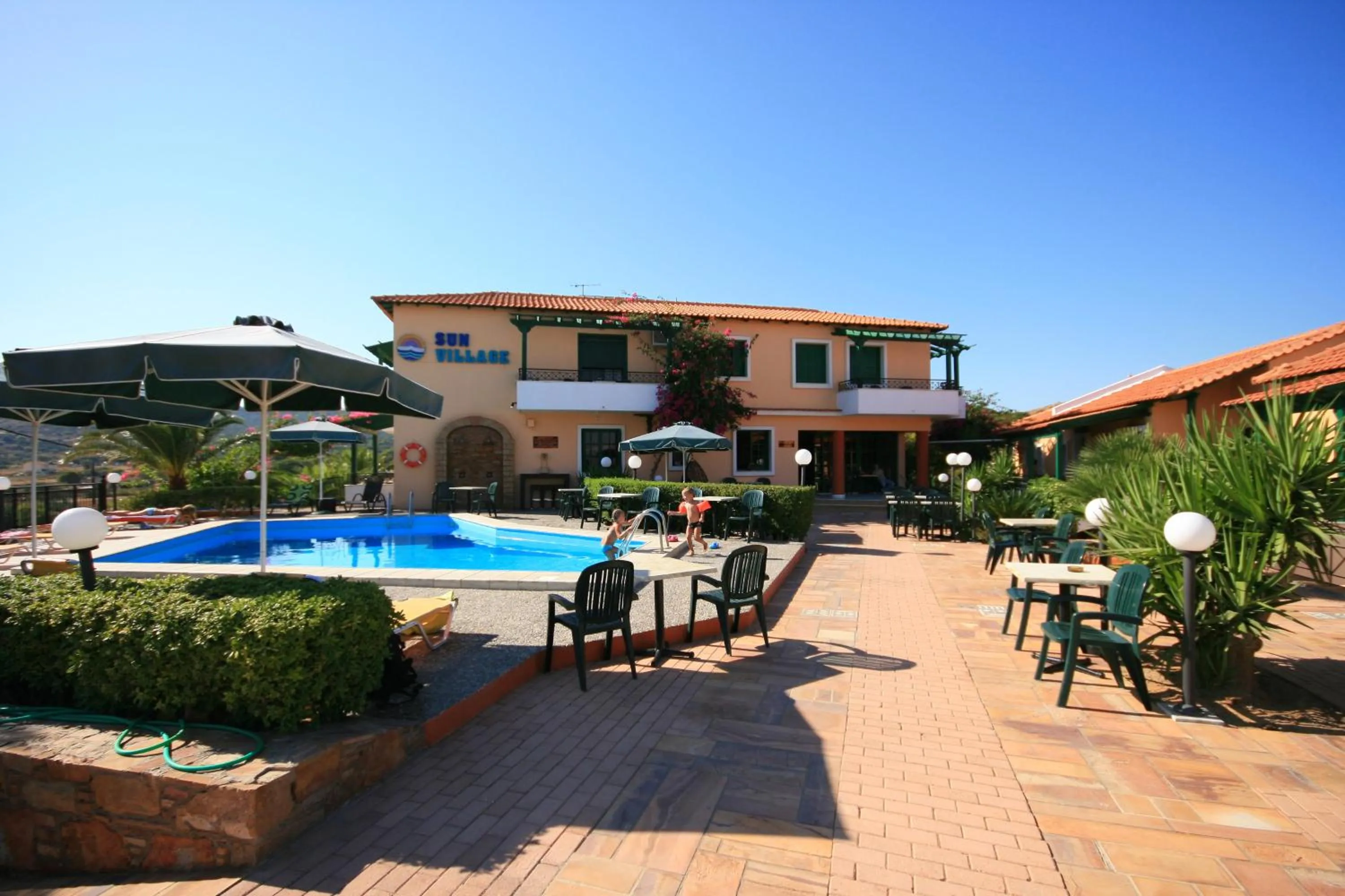 Property building in Sun Village Hotel Apartments