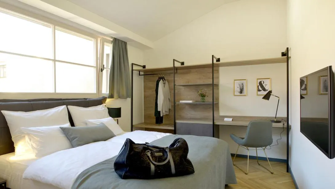 Bed in Hotel Maribor & Garden Rooms