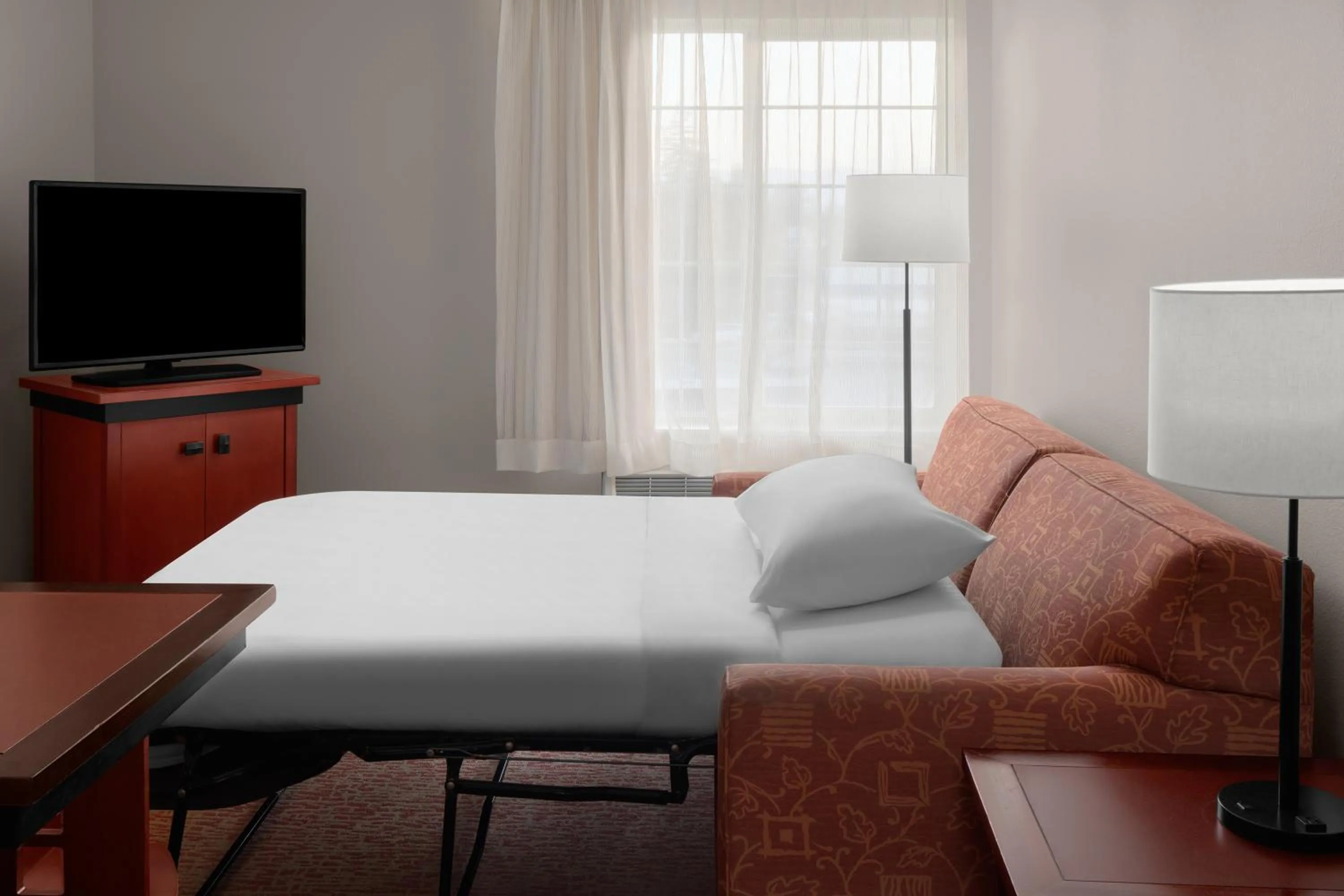 Bed in Larkspur Landing Extended Stay Suites Renton