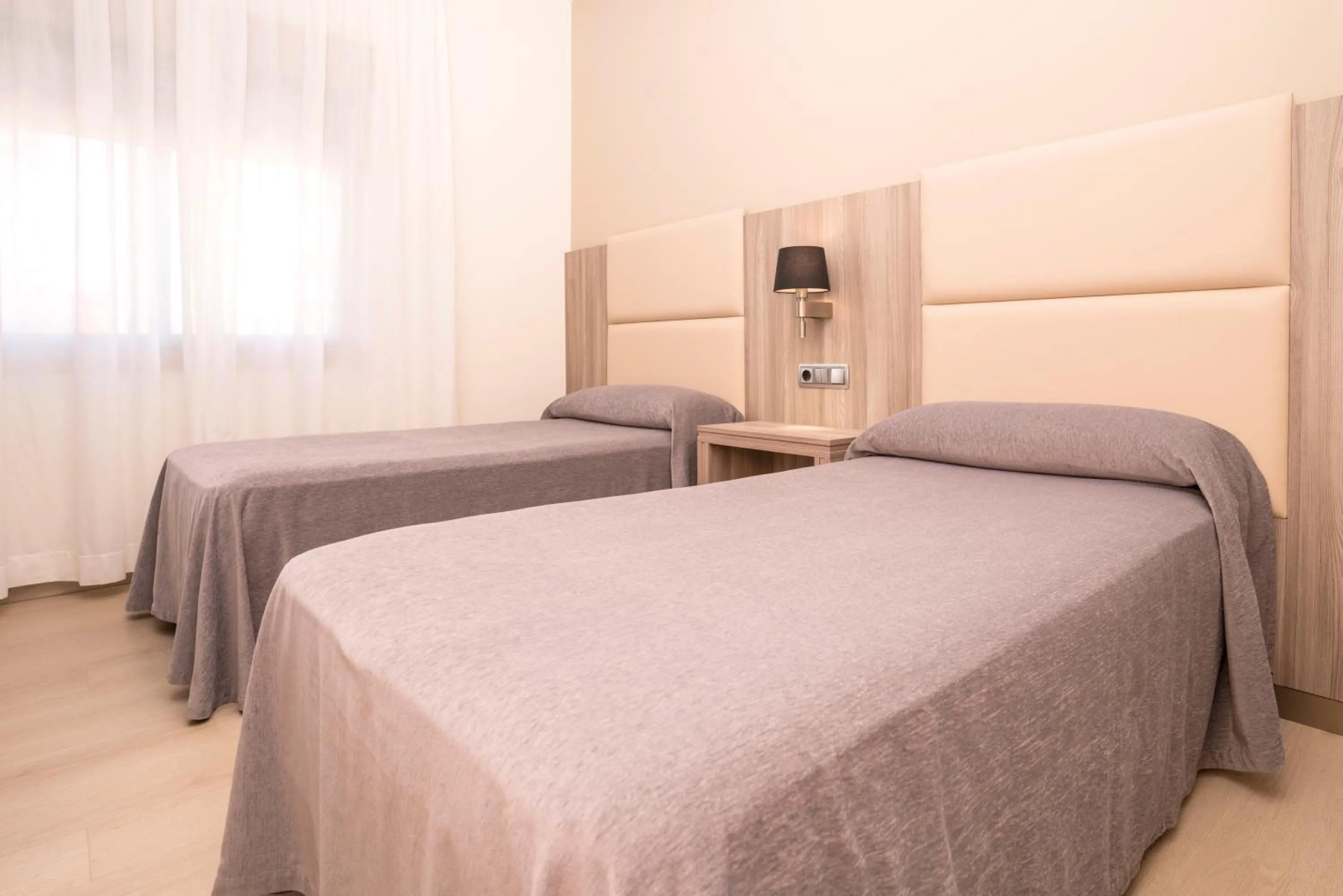 Bed in Apartamentos Atlántico Resort