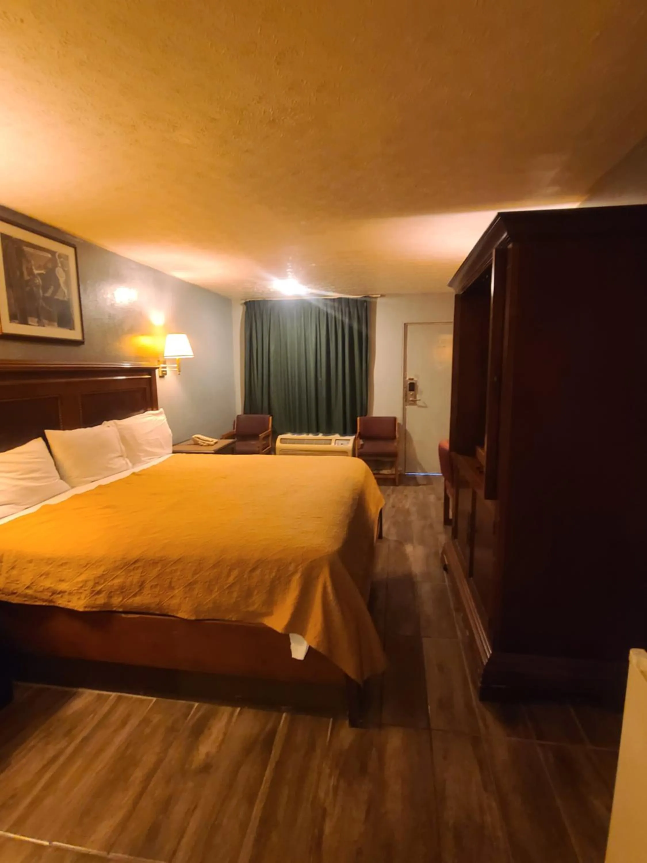 Bed in Garden Inn and Extended Stay