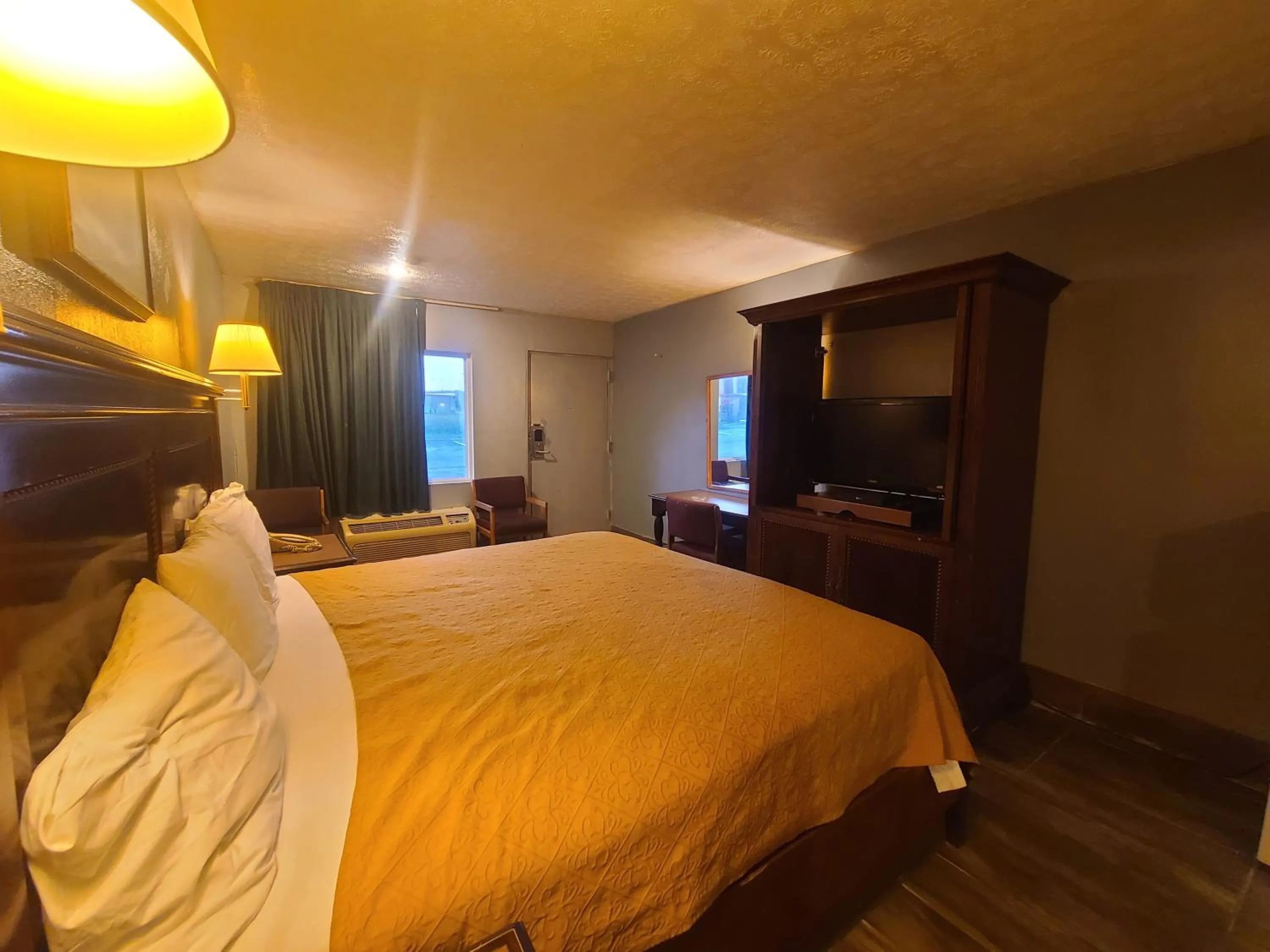 Bed in Garden Inn and Extended Stay