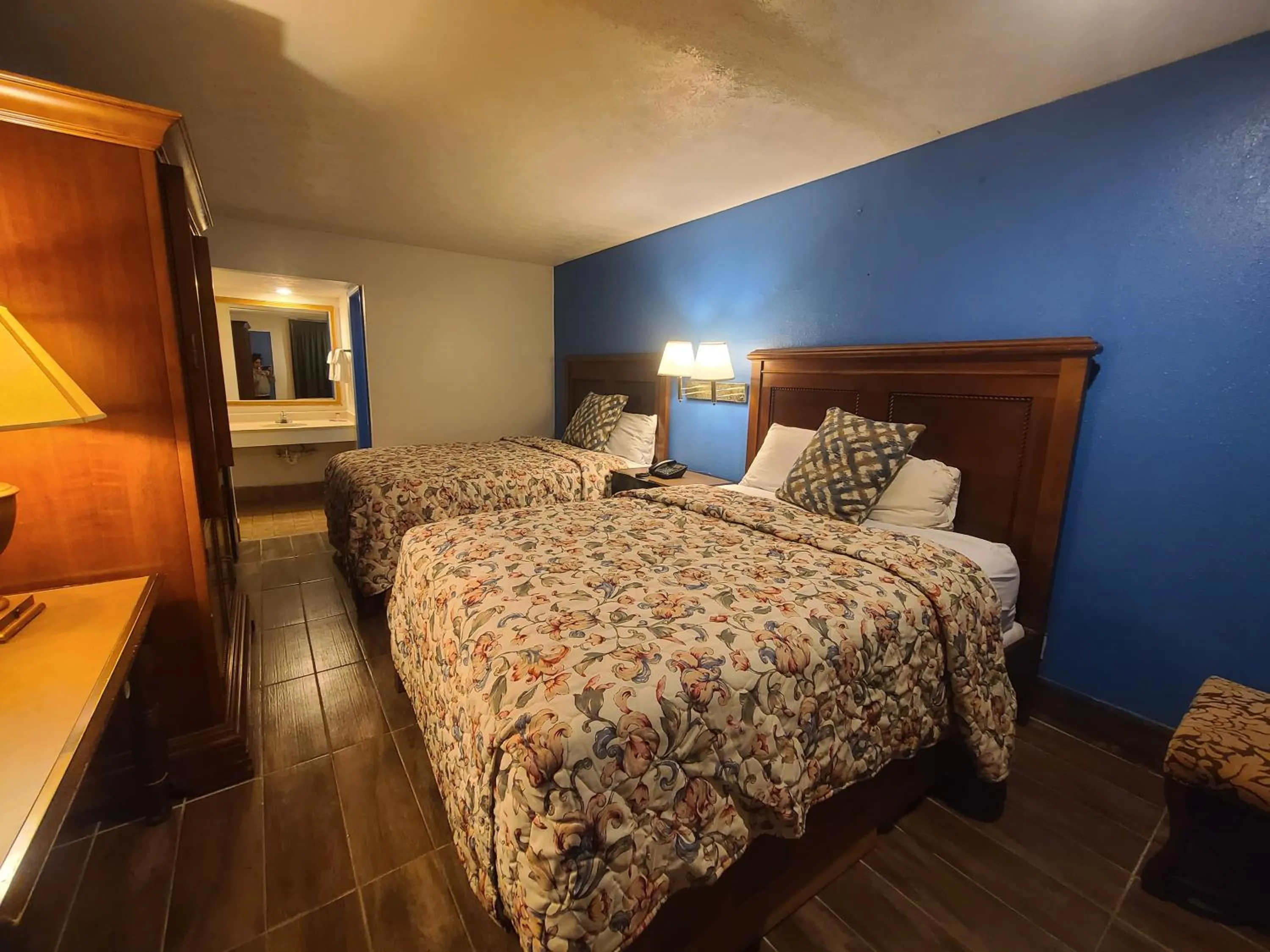 Bed in Garden Inn and Extended Stay