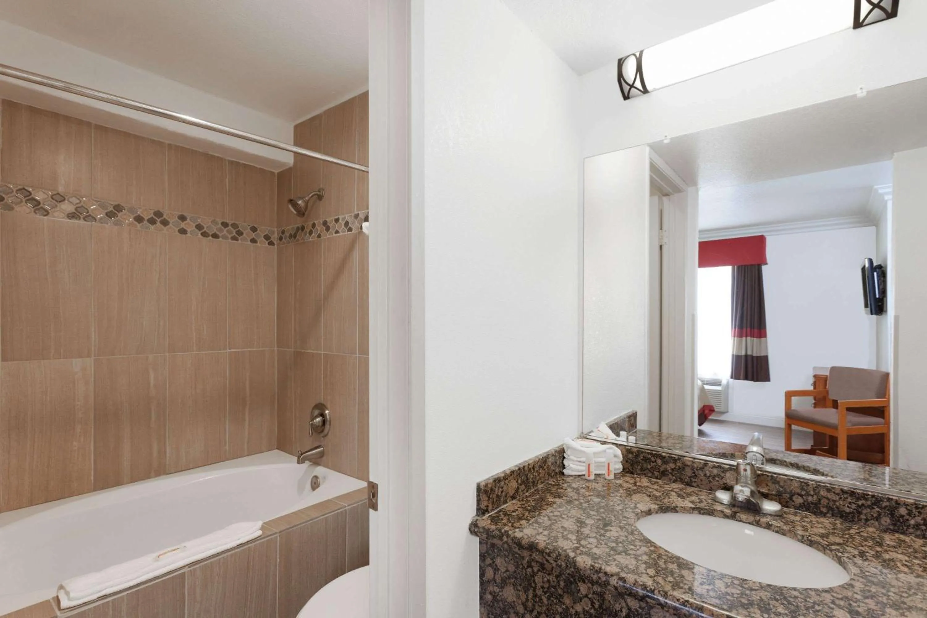 Bathroom in Super 8 by Wyndham Santa Clarita/Valencia