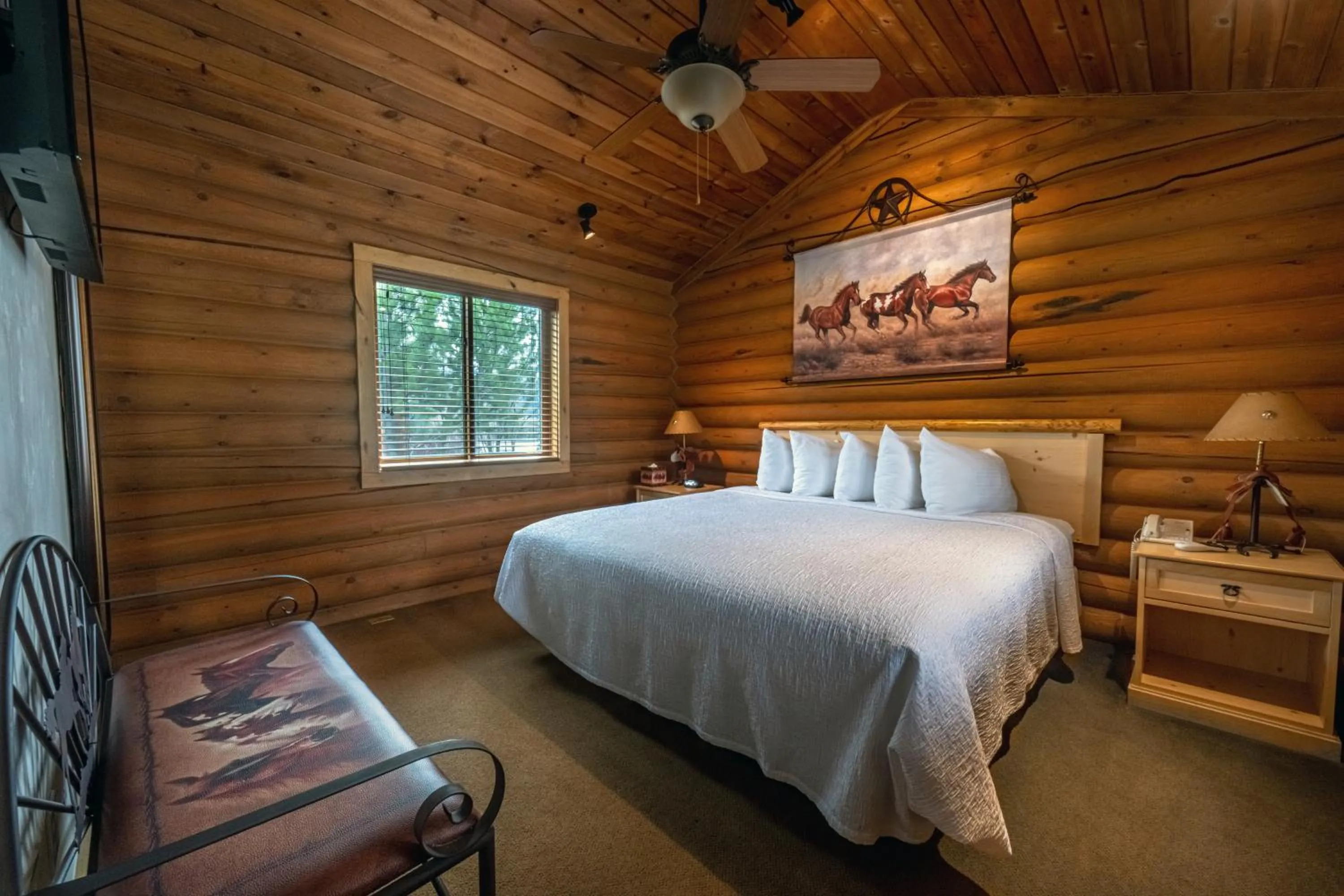 Bed in Flying Saddle Resort and Steak House