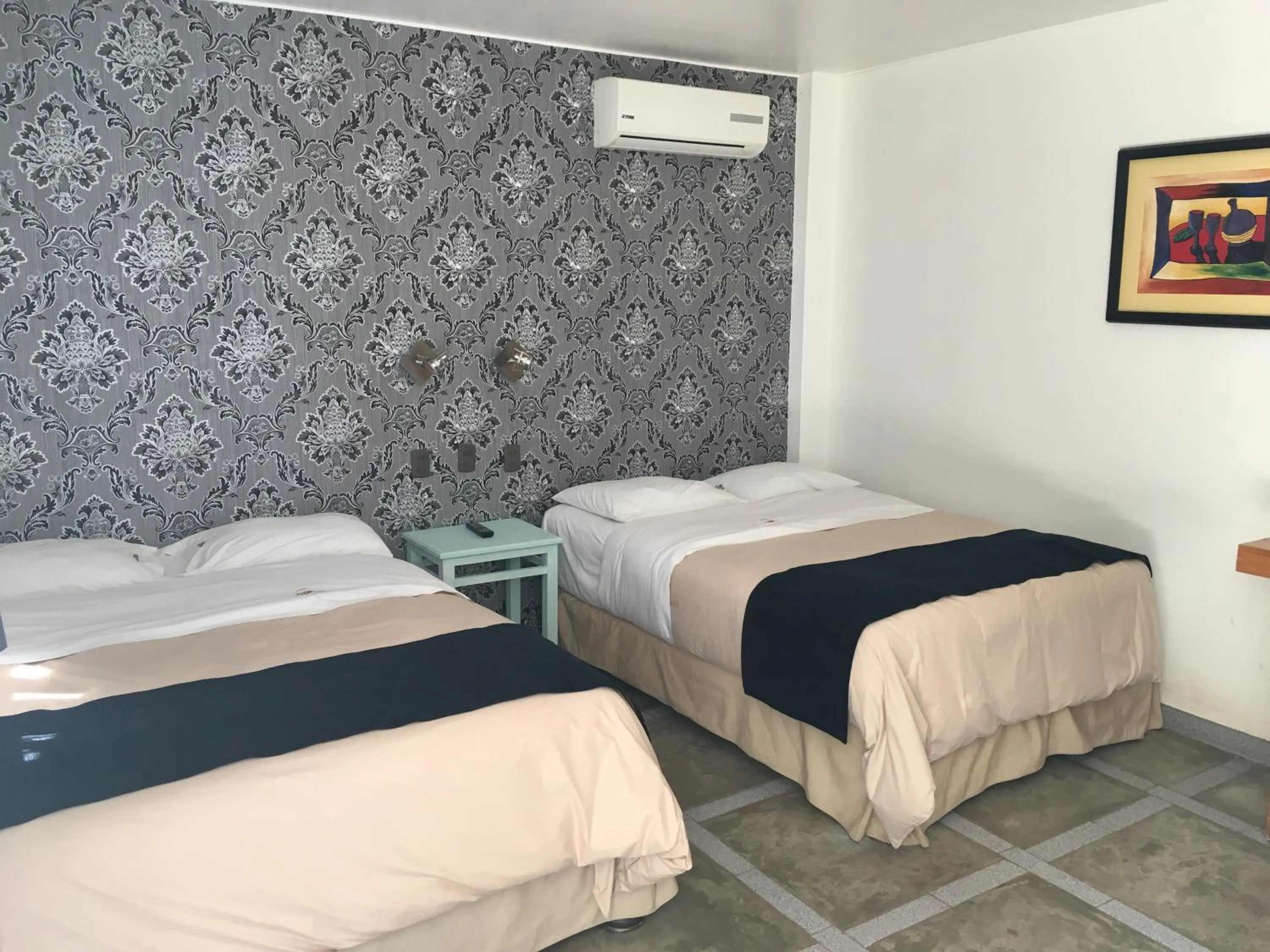 Bed in Hotel Villa Jazmin