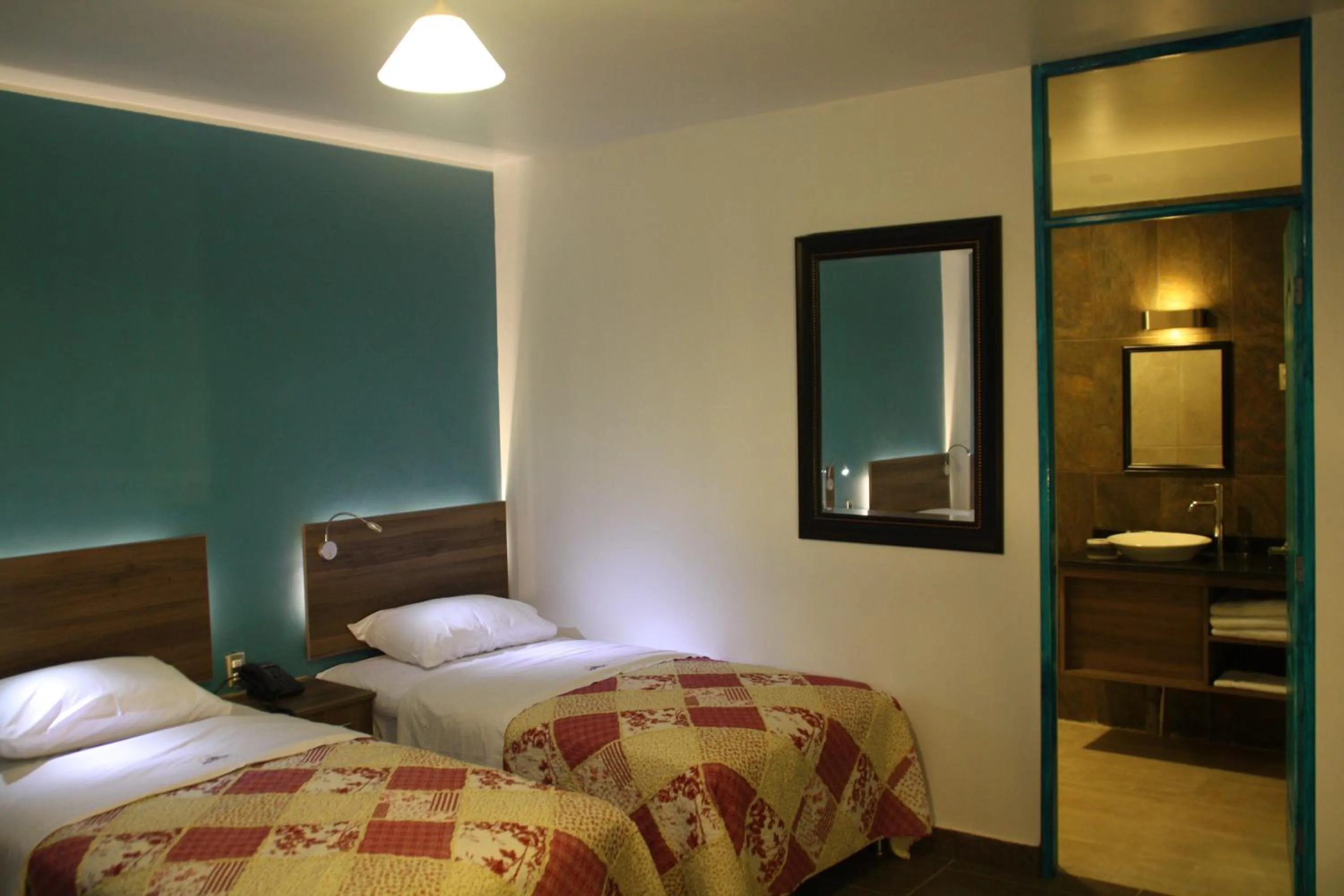 Bed in Hotel Villa Jazmin