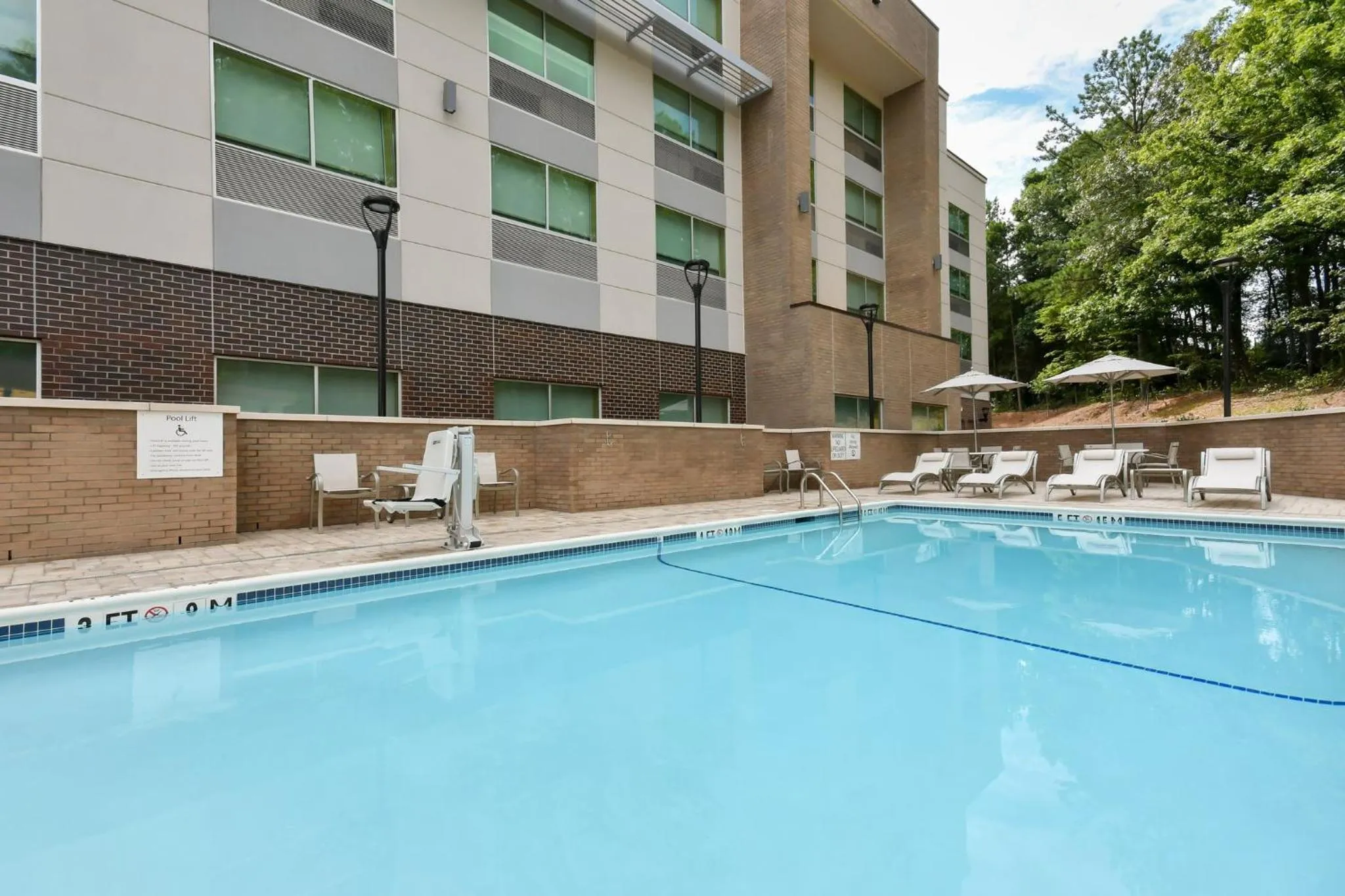 Swimming pool in Holiday Inn Express & Suites Charlotte - Ballantyne by IHG