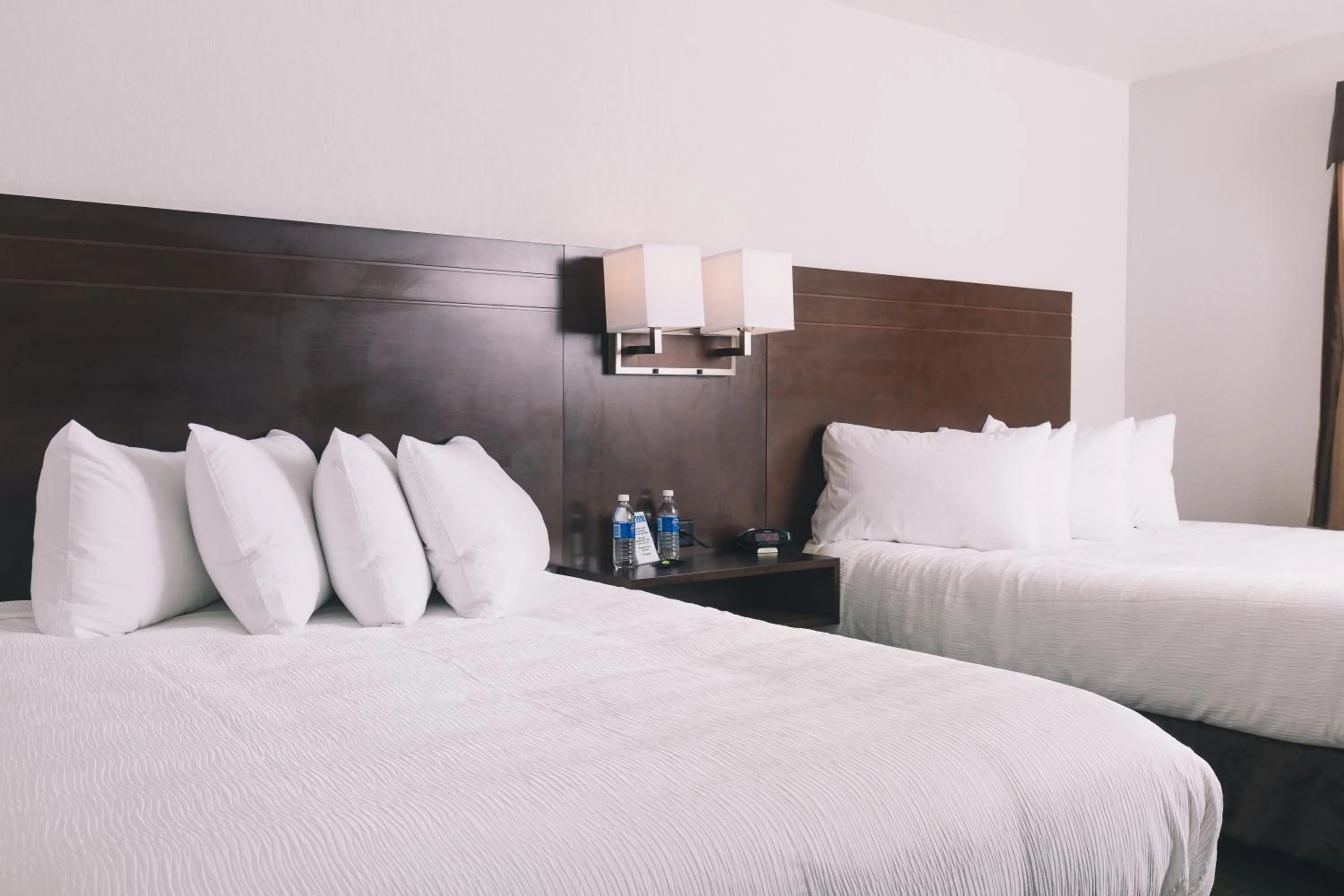 Bed in Service Plus Inns and Suites