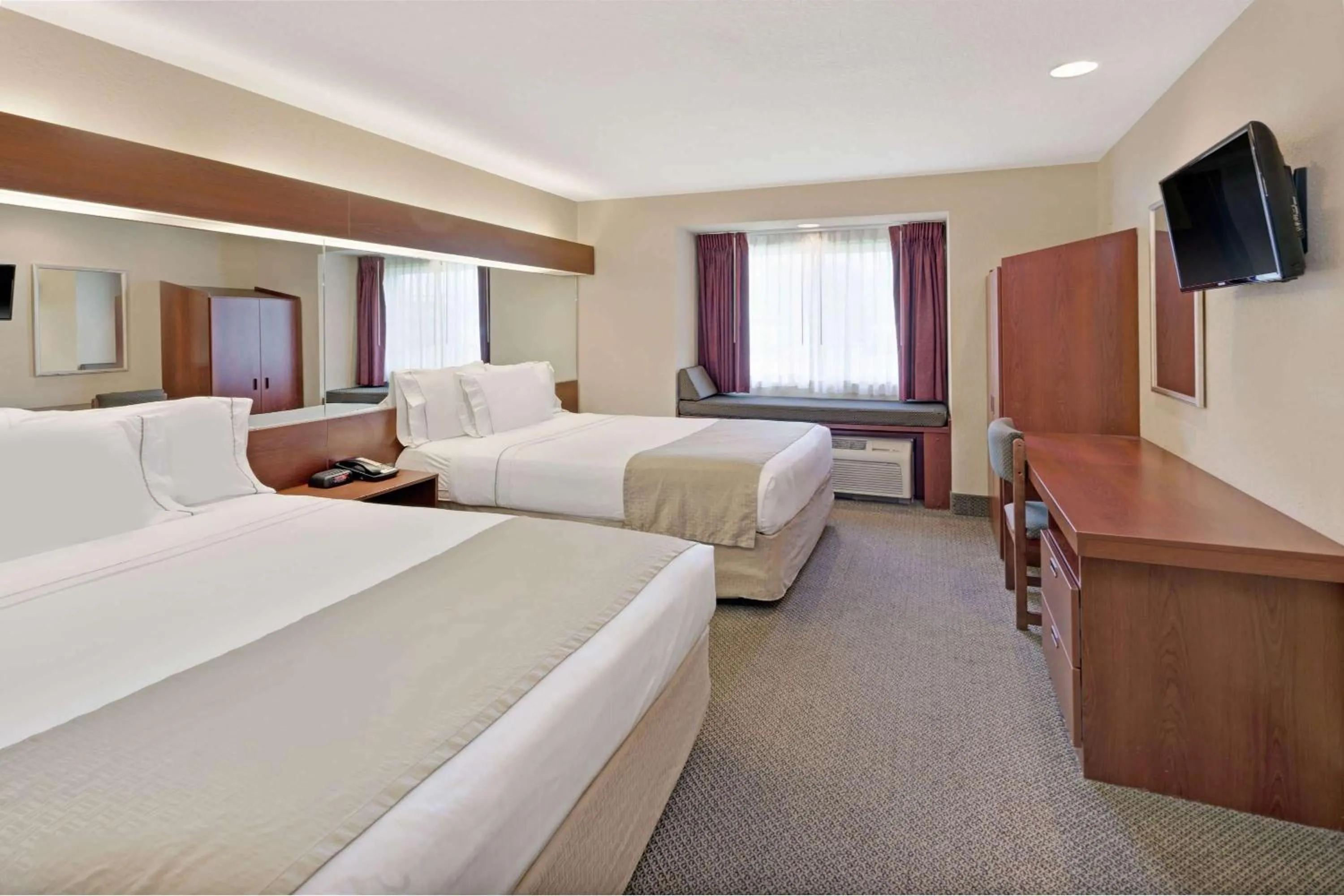 Photo of the whole room, Bed in Microtel Inn & Suites by Wyndham Jasper