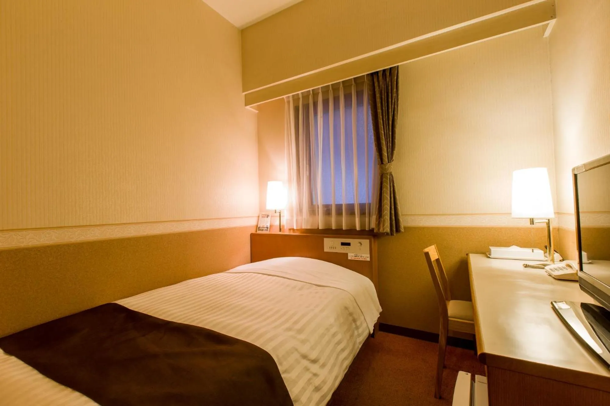 Bed in Hotel New Star Ikebukuro