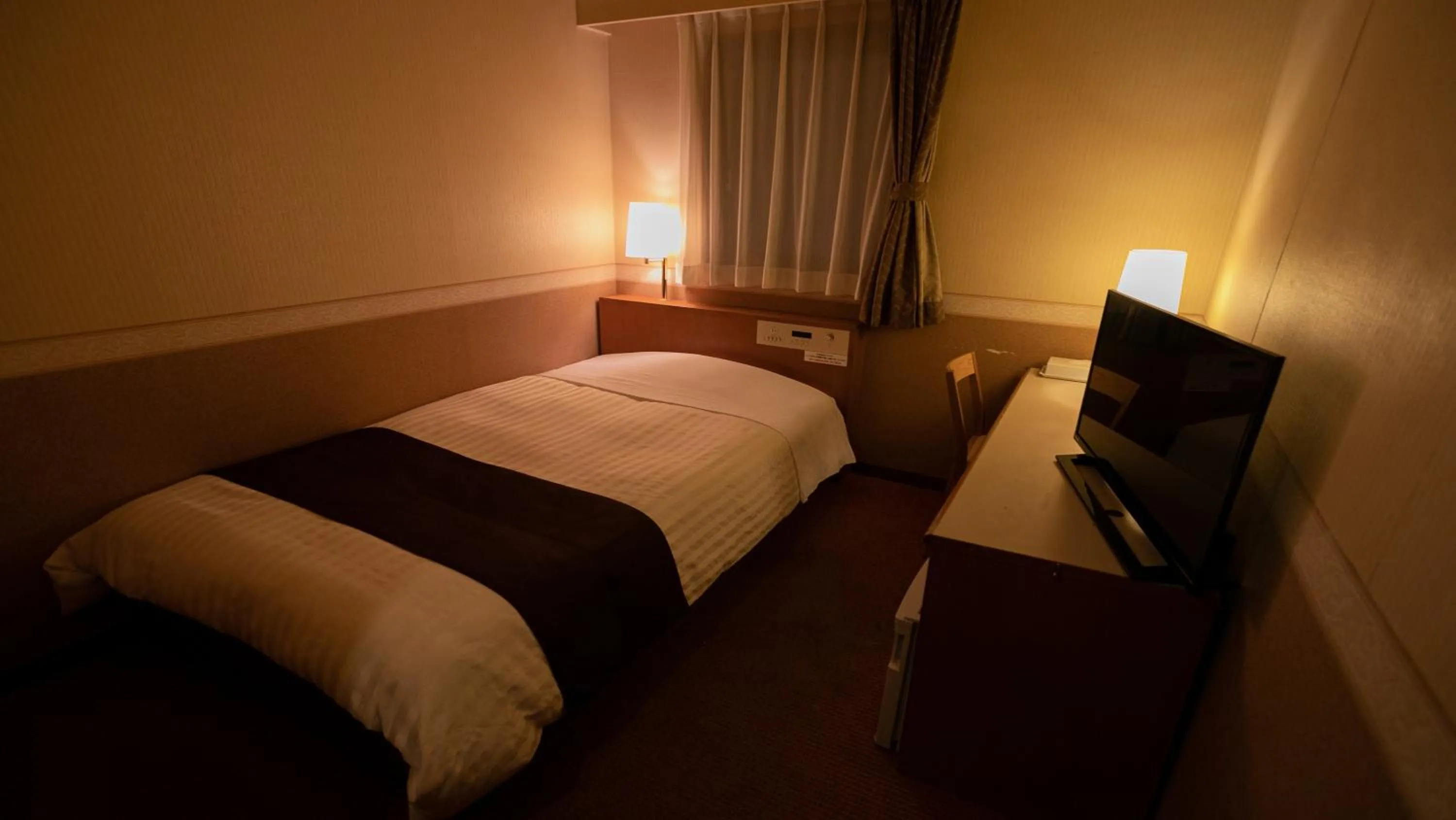 Bed in Hotel New Star Ikebukuro