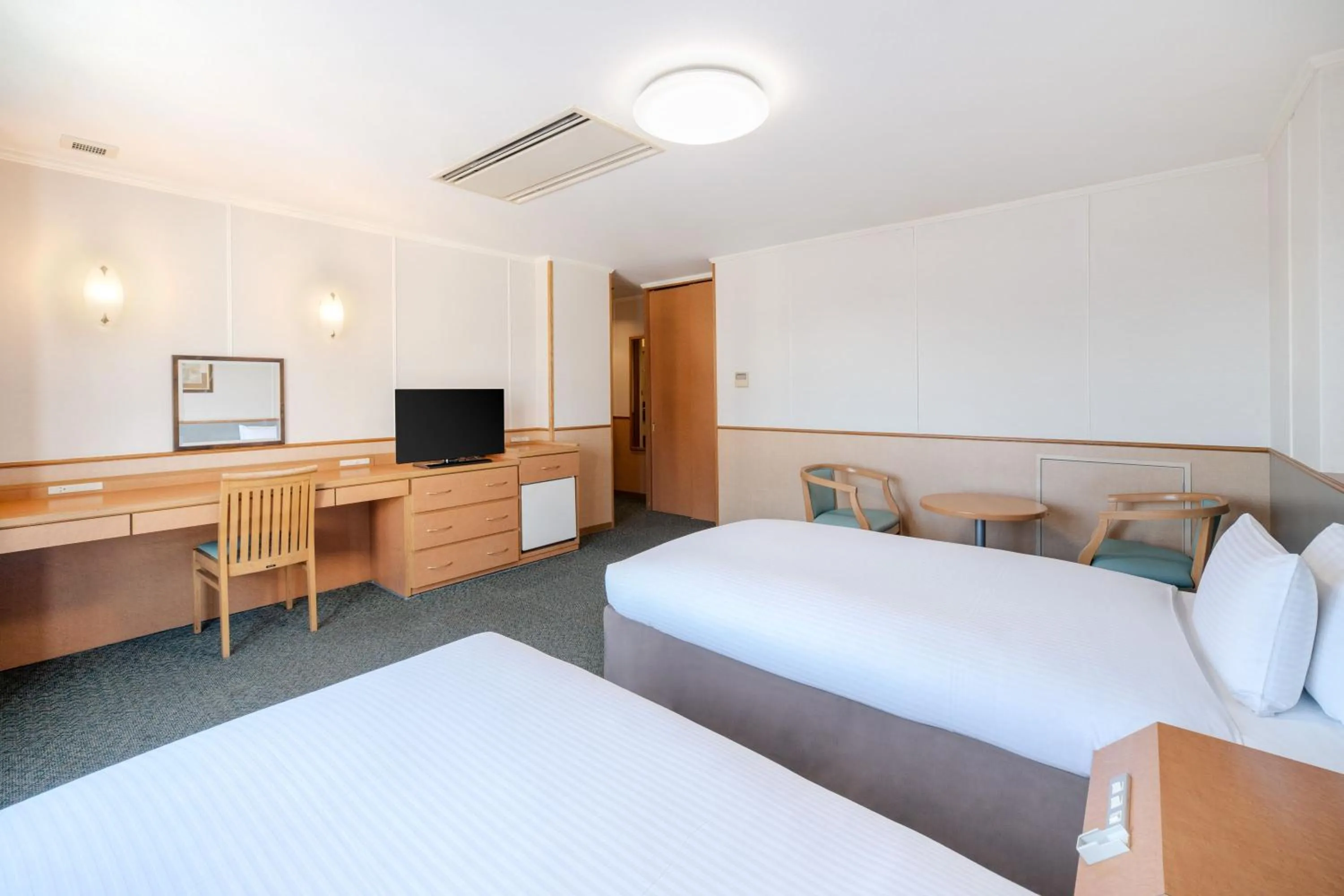Bed in Central Hotel Sasebo