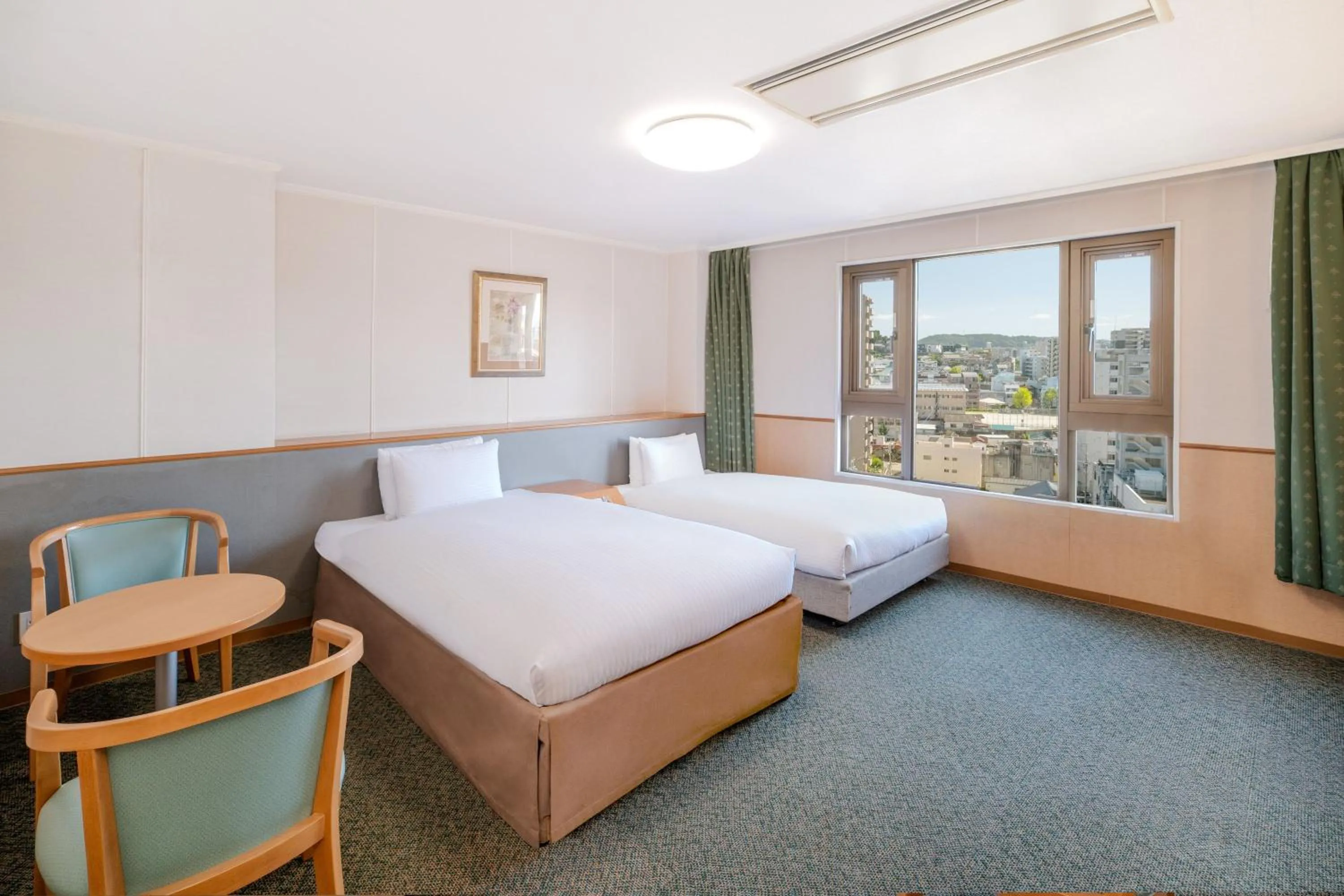 Bed in Central Hotel Sasebo