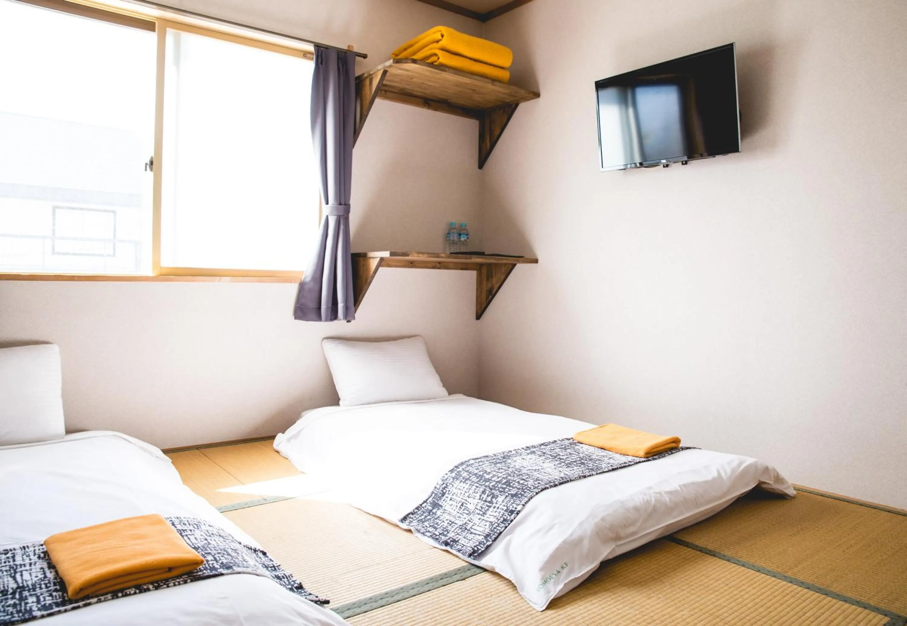 Bed in Hakuba Cortina Lodge