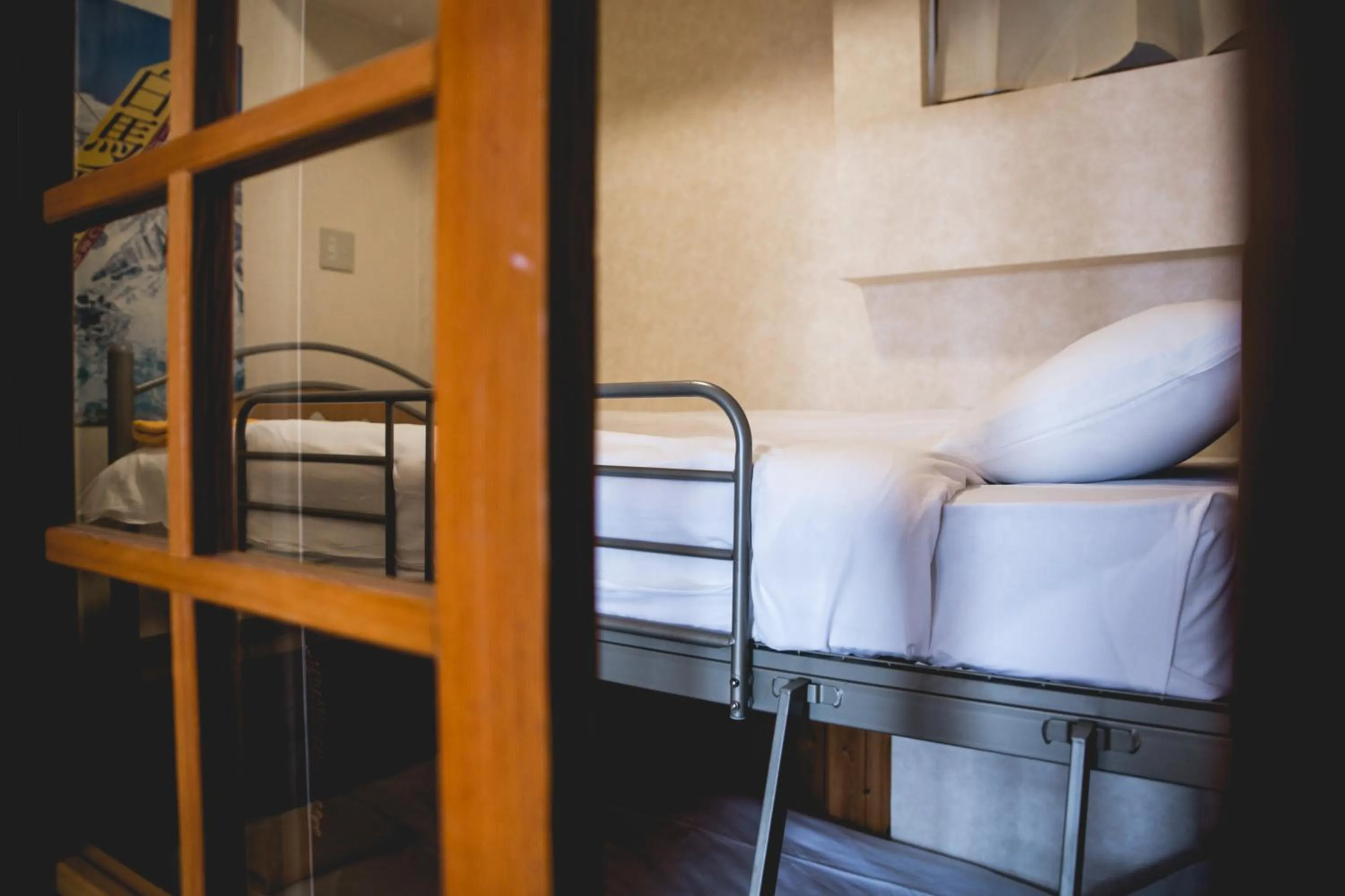 Bed in Hakuba Cortina Lodge