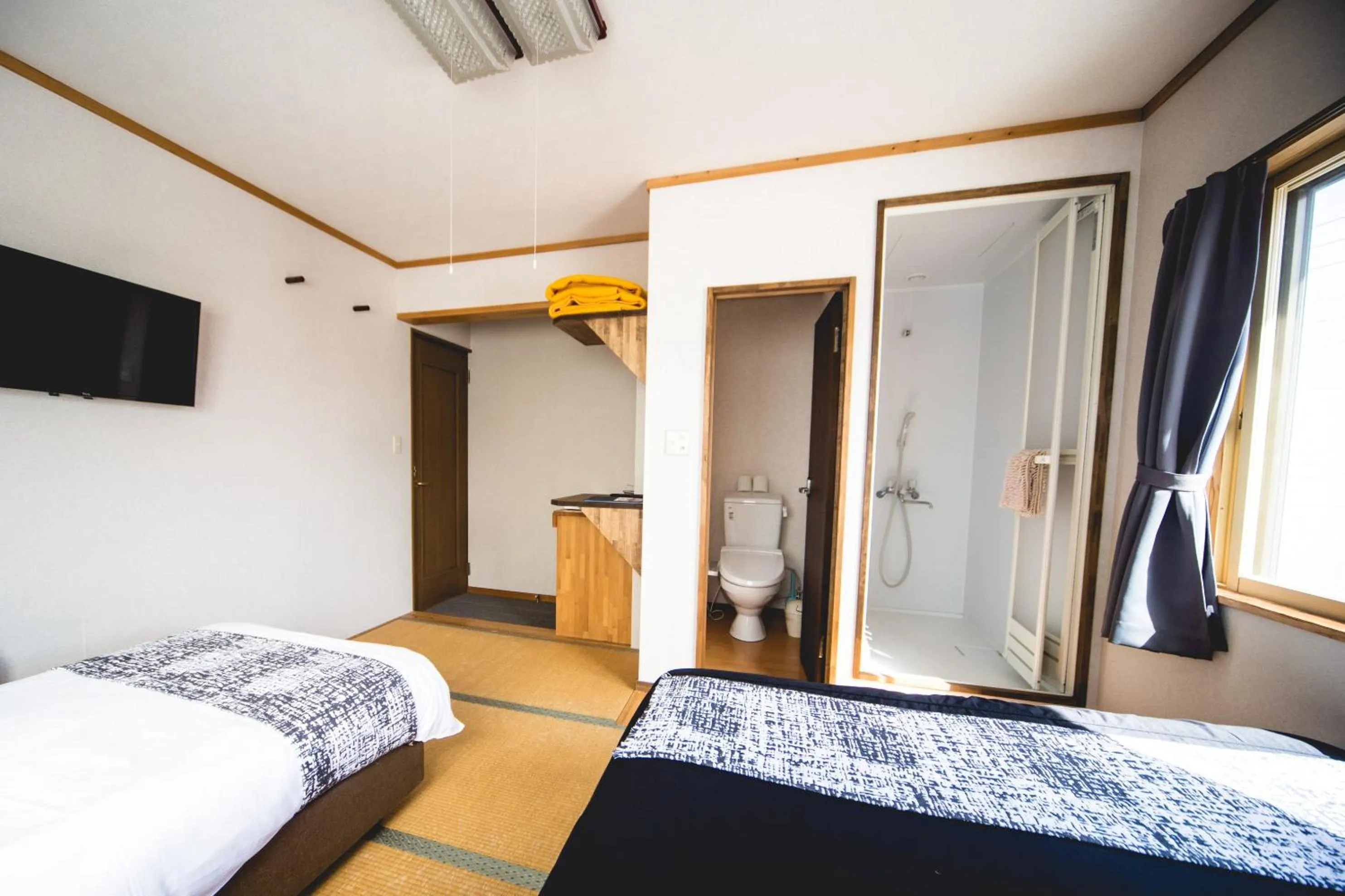Shower, Bed in Hakuba Cortina Lodge