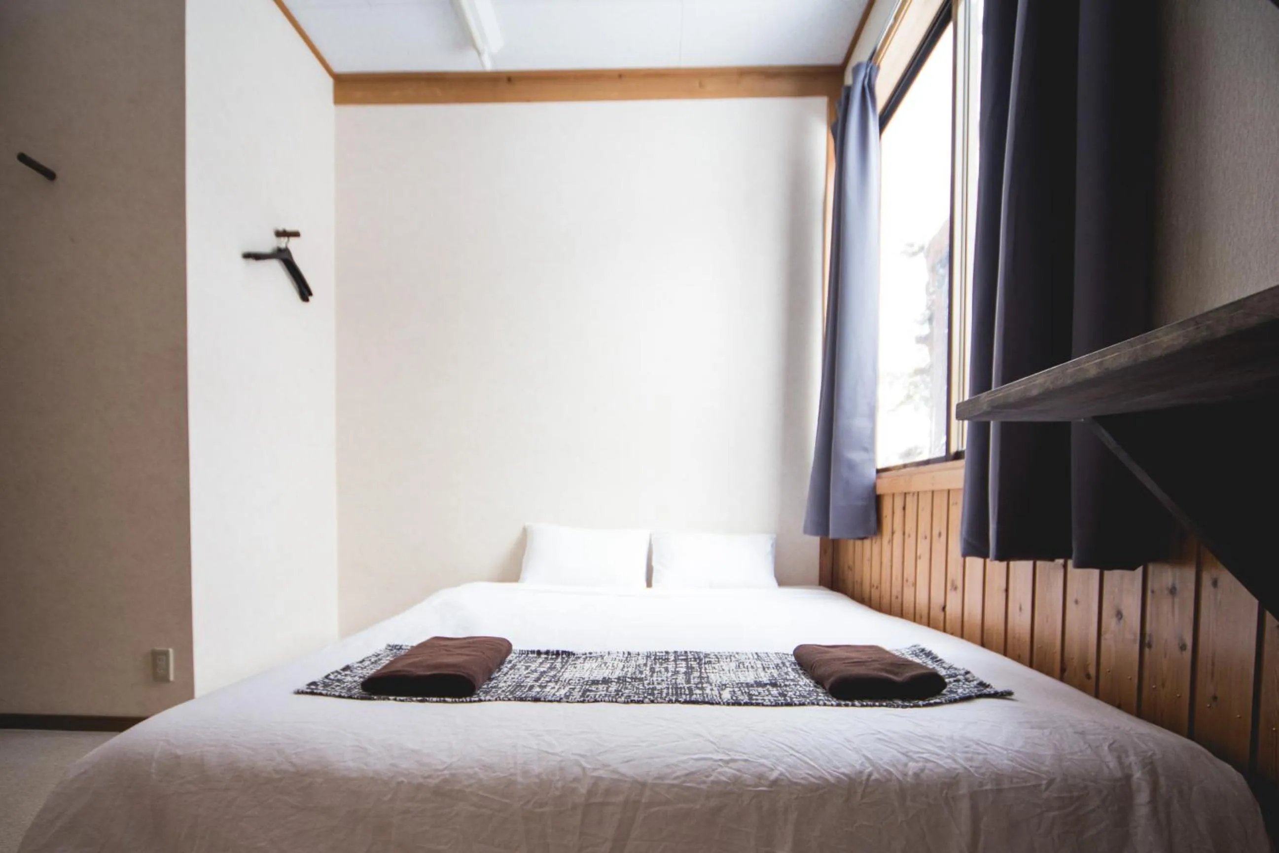 Bed in Hakuba Cortina Lodge