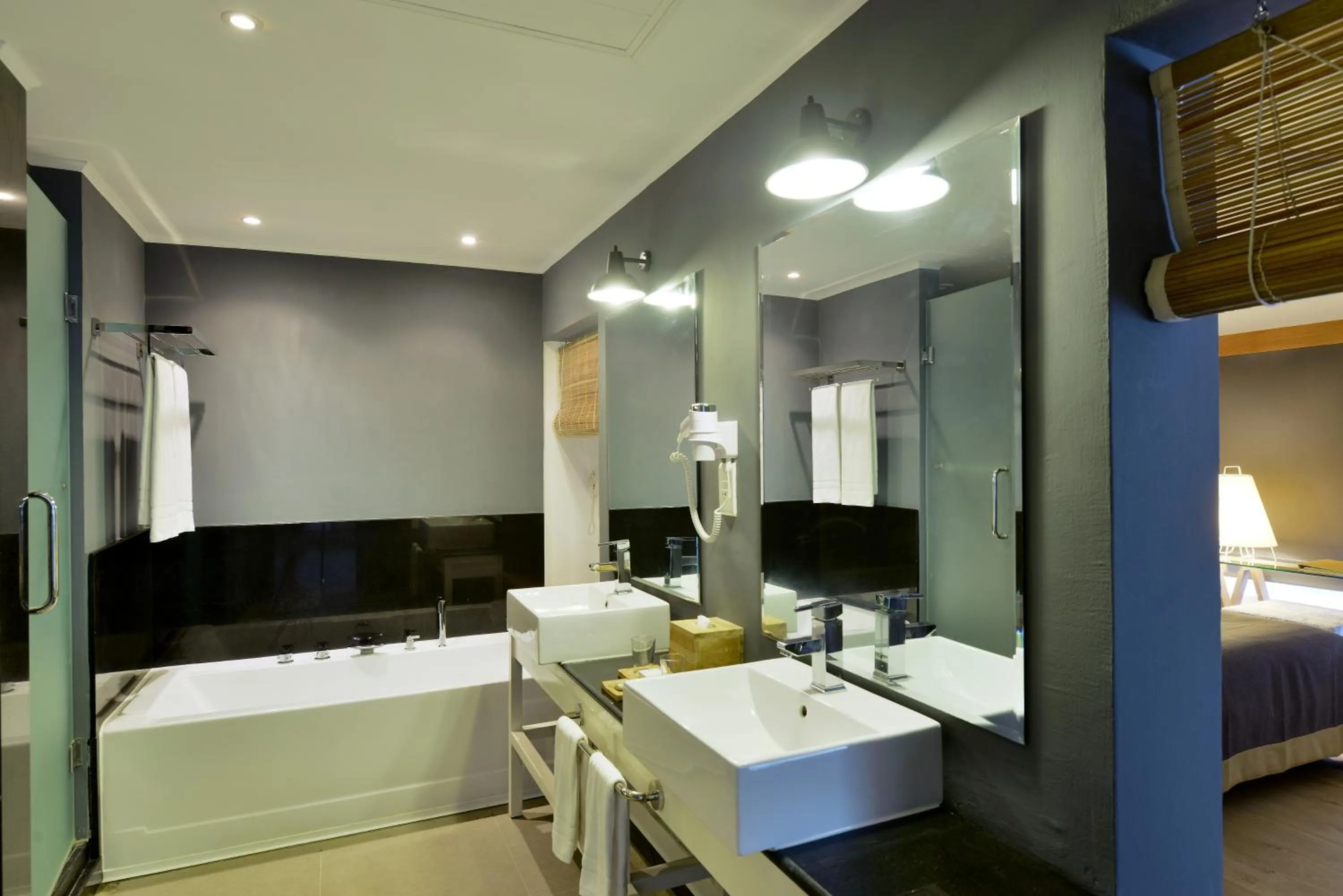 Bathroom, Bed in The Ravenala Attitude