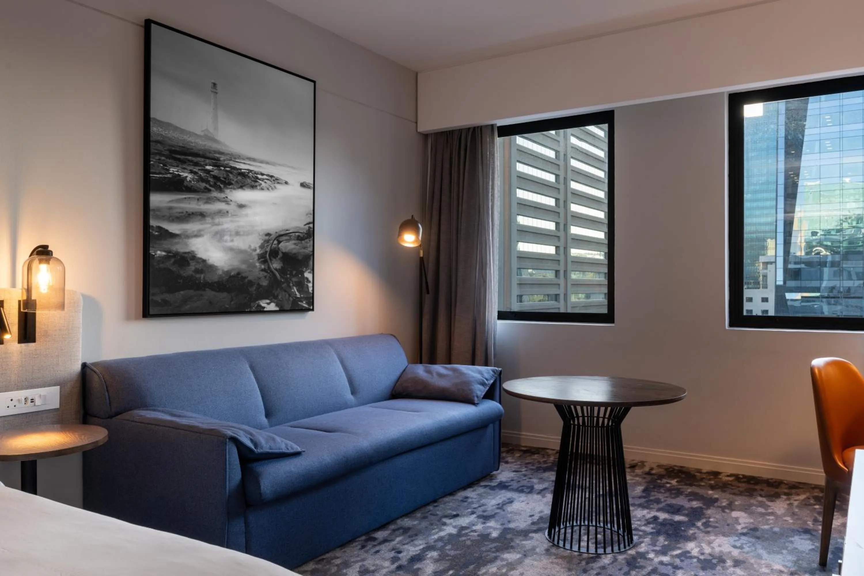 Seating area, Bed in Radisson Hotel Cape Town Foreshore