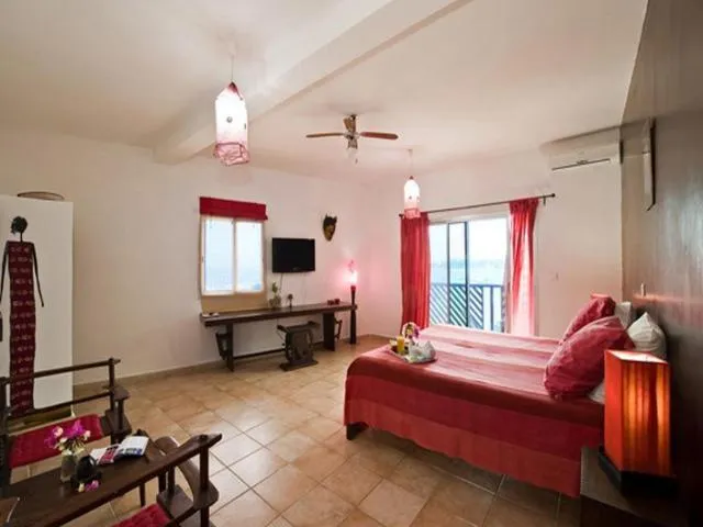 Photo of the whole room, Bed in La Maison Abaka