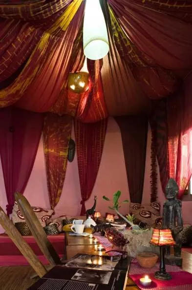 Communal lounge/ TV room in La Maison Abaka